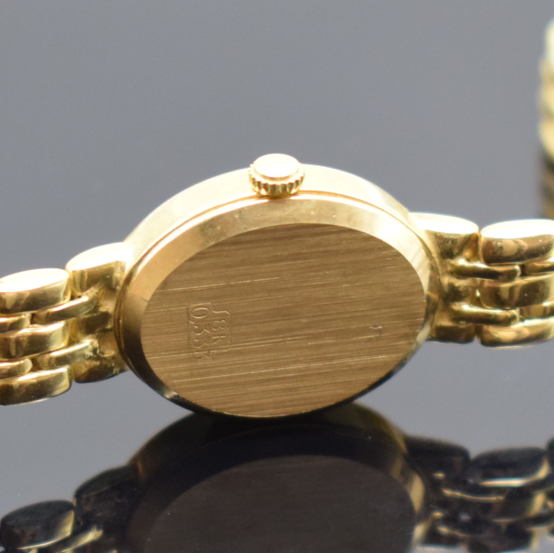 Detail c: DE LUXE Quartz Damenarmbanduhr in GG 333/000, Schweiz um 2000, Geh. an Goldband 333/000, Boden aufgedr., champagnerfarb. Zifferbl. m. gold. ...