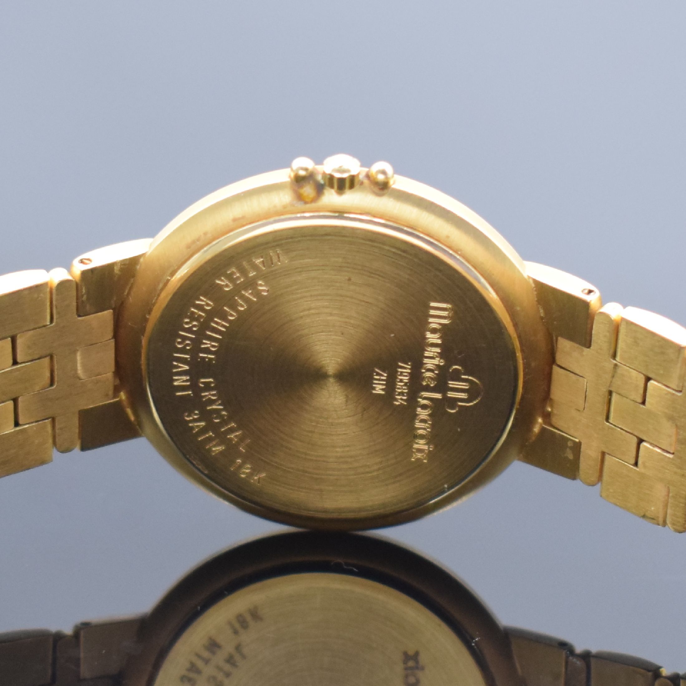 Detail e: MAURICE LACROIX Herrenarmbanduhr in GG 750/000, quarz, Schweiz um 1995, massives Geh. inkl. Gliederband m. dopp. Faltschl., Boden aufgedr., ...