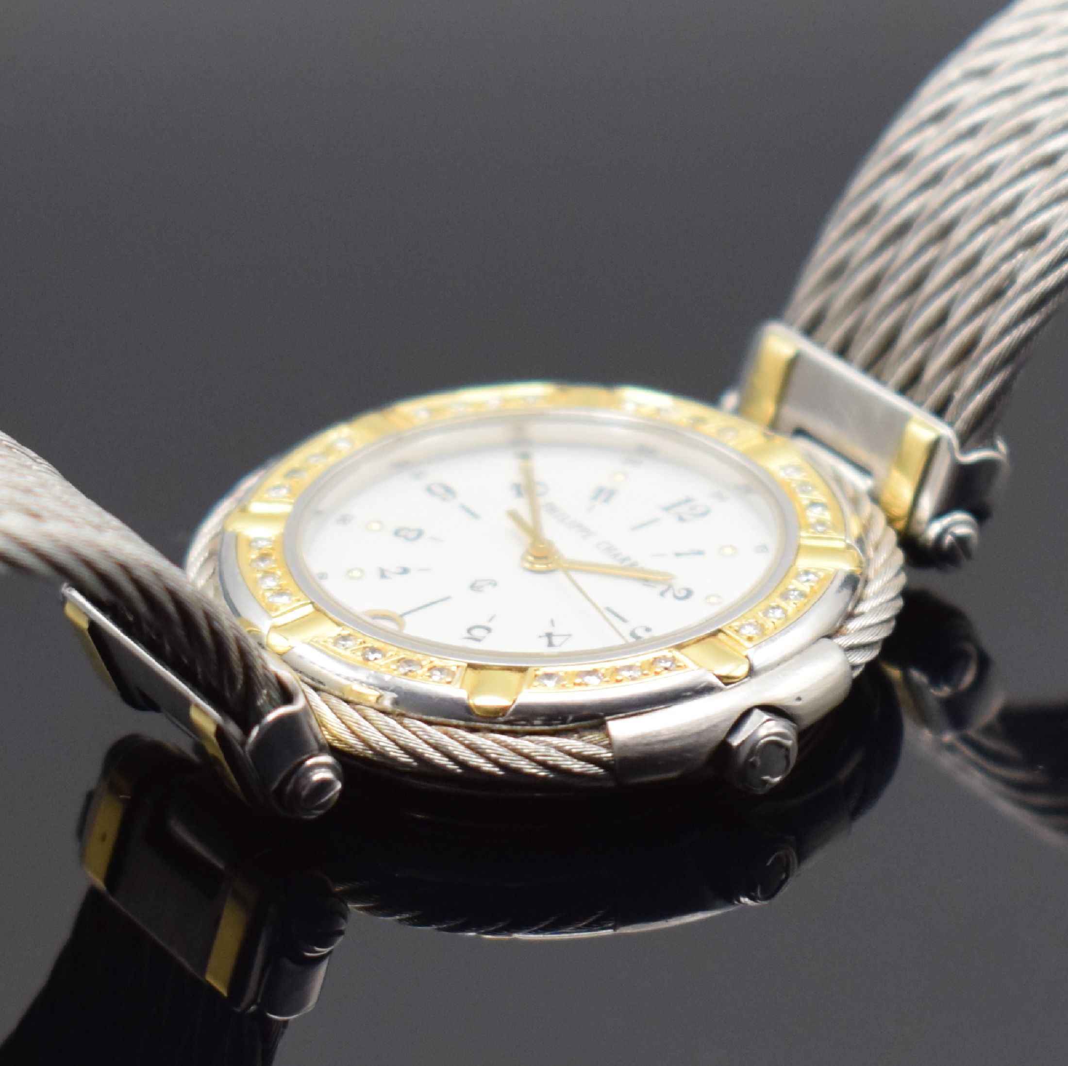 Detail c: PHILIPPE CHARRIOL Armbanduhr, quarz, Schweiz um 1990, Edelstahl/Gold kombiniert inkl. 6- reihigem Kordelband, Boden aufgedr., Goldlünette aufw. m. ...