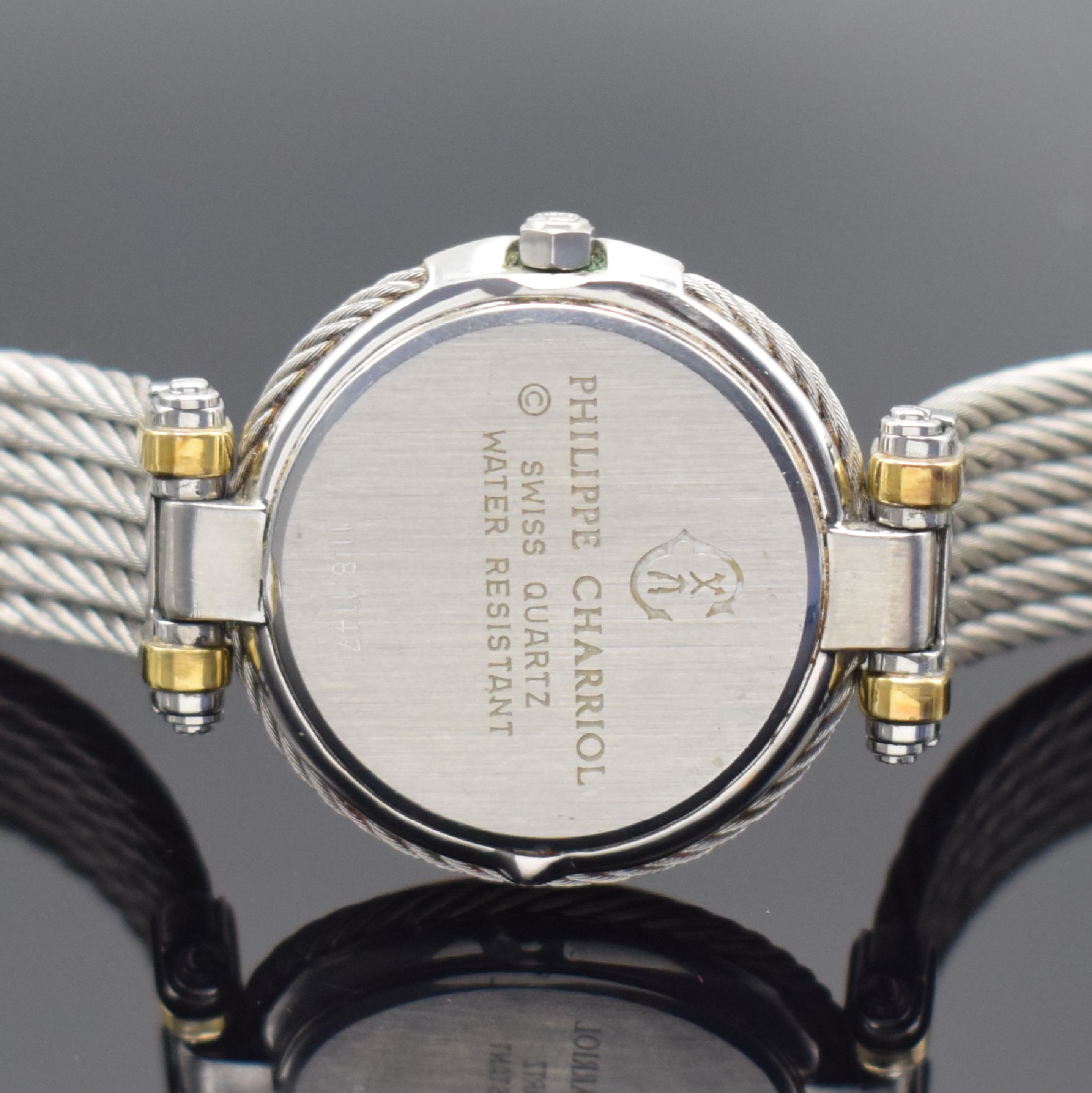 Detail d: PHILIPPE CHARRIOL Armbanduhr, quarz, Schweiz um 1990, Edelstahl/Gold kombiniert inkl. 6- reihigem Kordelband, Boden aufgedr., Goldlünette aufw. m. ...