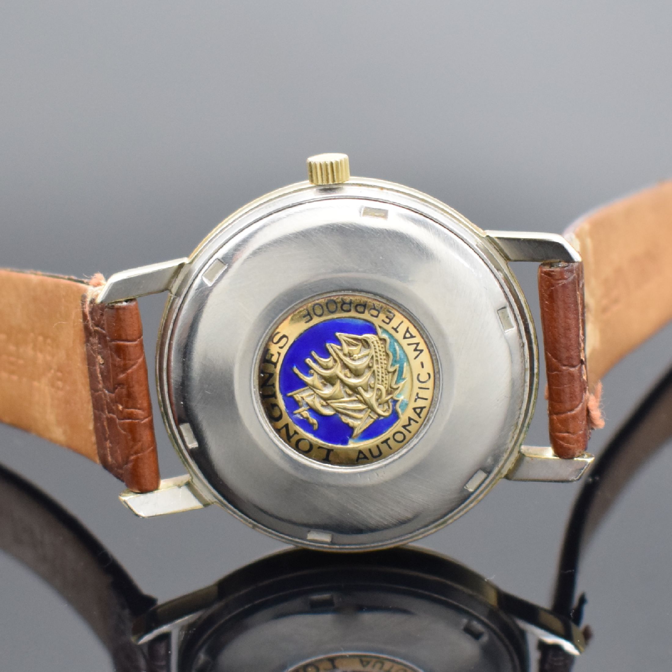 Detail c: LONGINES Flagship Herrenarmbanduhr mit Goldhaube Referenz 3108-3, Schweiz um 1961, Automatik, Boden m. zentraler Plakette verschr., silb. Zifferblatt ...
