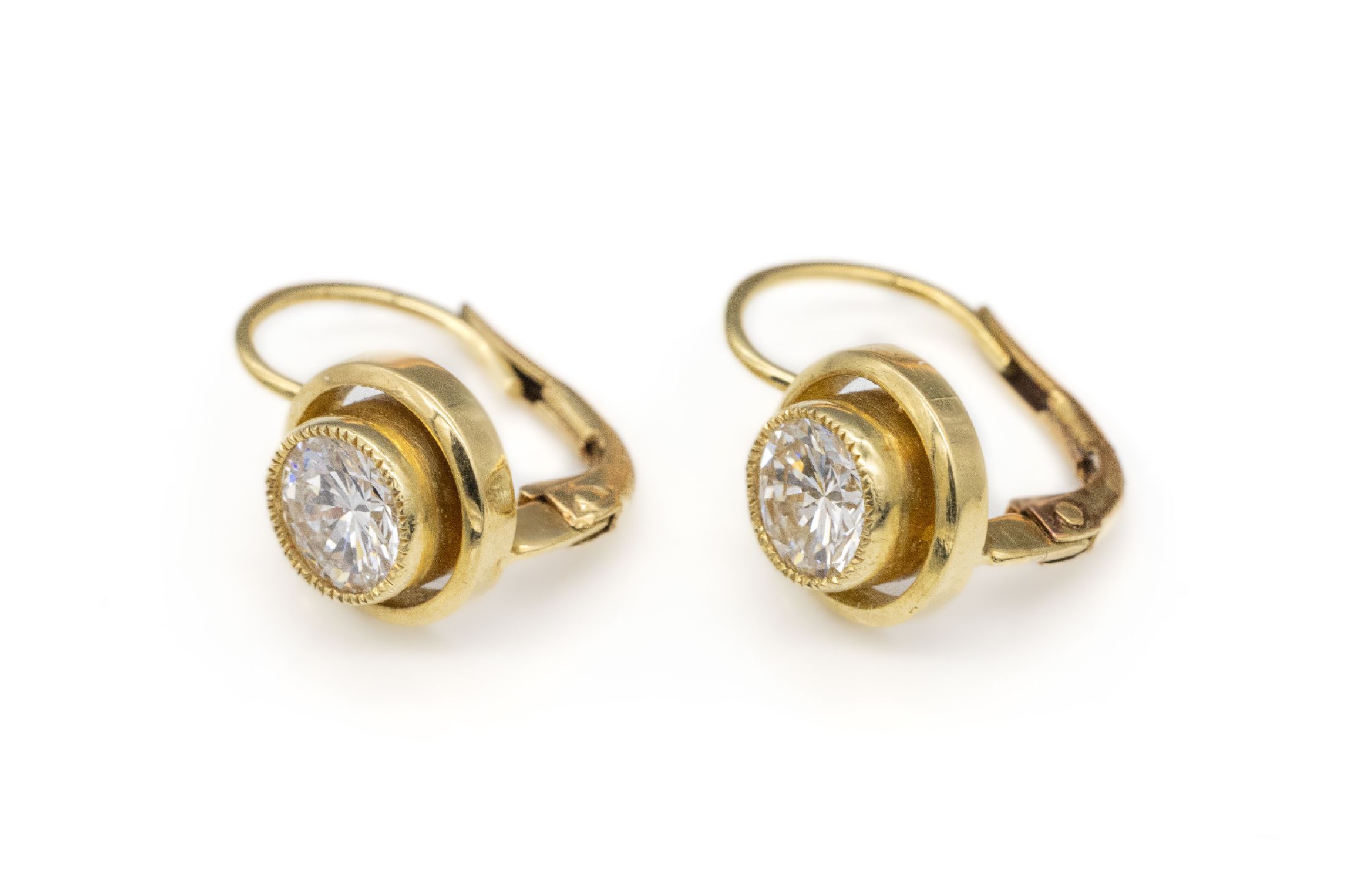 Paar 18 kt Gold Brillant-Ohrstecker, GG 750/000, 2 Brillanten zus. ca. 1.10 ct feines Weiß/vs, ca. 3.4 g, mit Etui