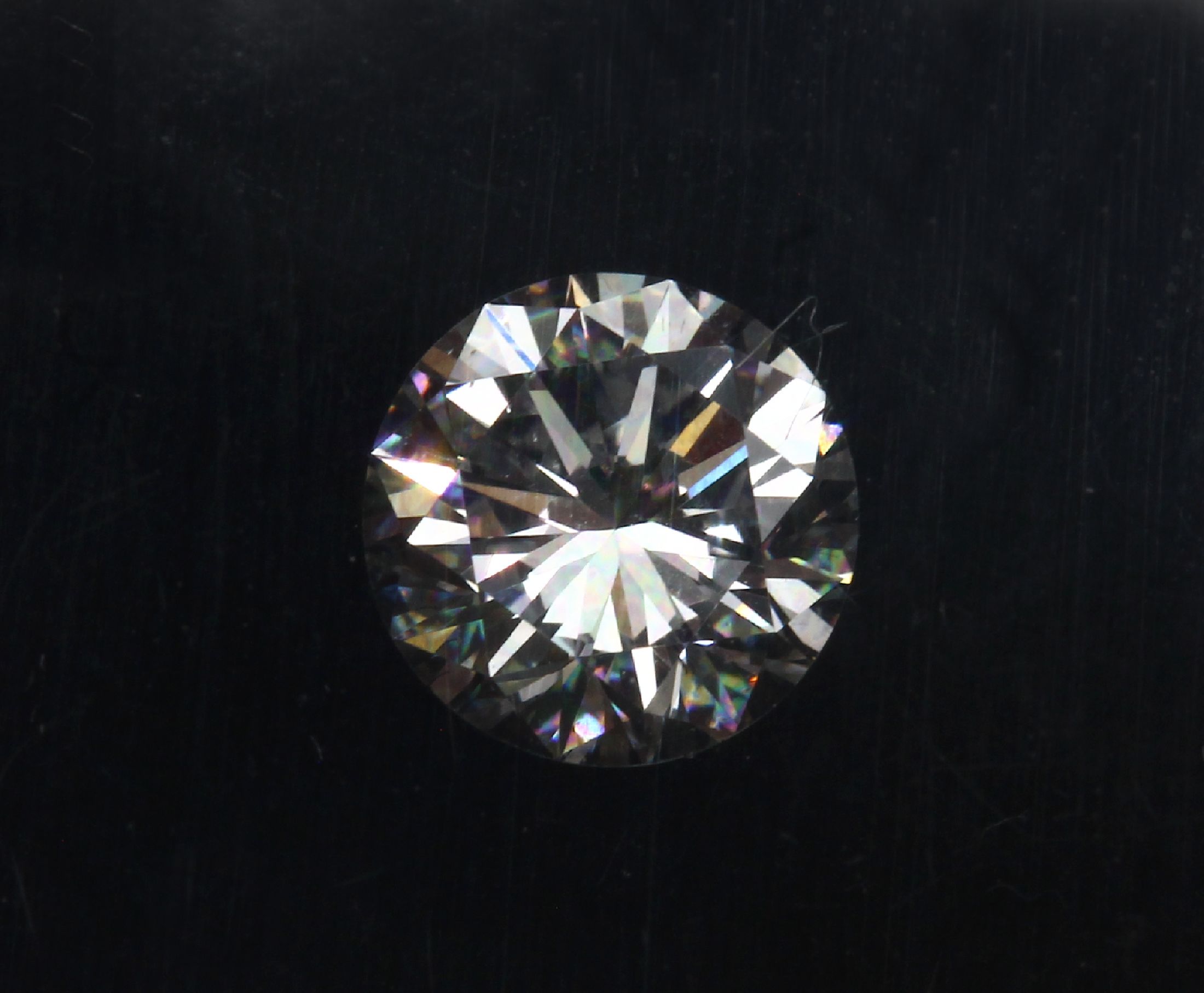 Detail a: Brillant 0.617 ct feines Weiß+/vs, verplombt