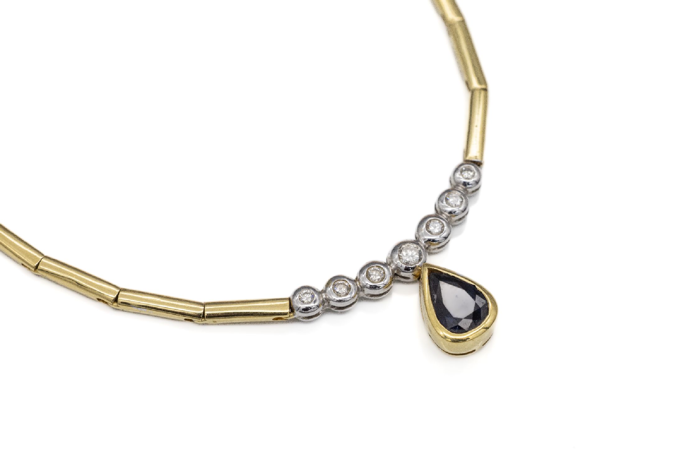 18 kt Gold Diamant-Saphir-Collier, GG 750/000, facett. Saphirtropfen ca. 1.10 ct, 7 in WG gefasste Brillanten zus. ca. 0.20 ct Weiß/si, L. ca. 38.5 ...