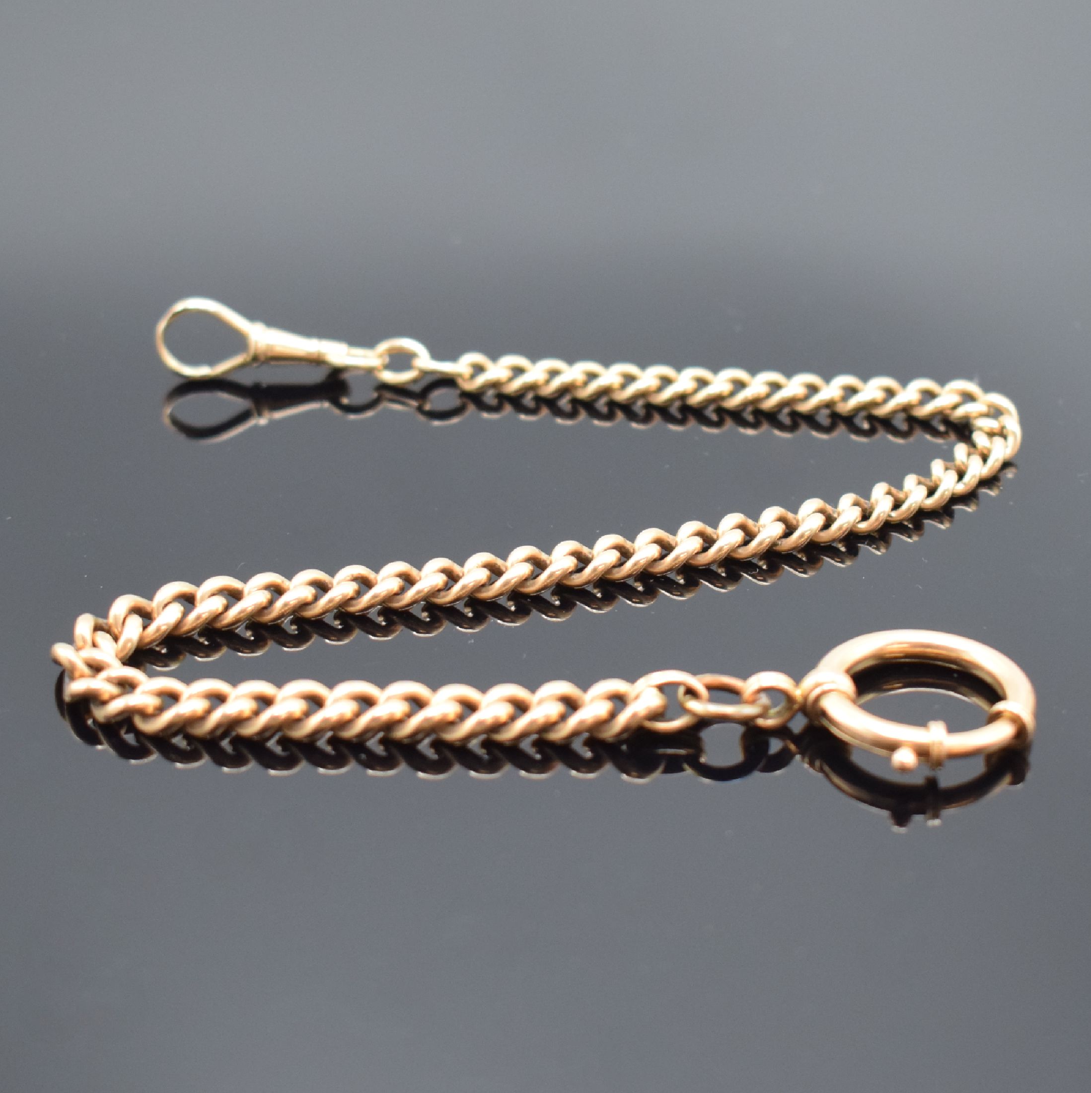 Rotgold 585/000 schwere Taschenuhrkette, um 1900, schöner Verlauf im Rundpanzer-Design, Karabiner & Federring, eine Öse ers., L. ca. 29 cm, ...