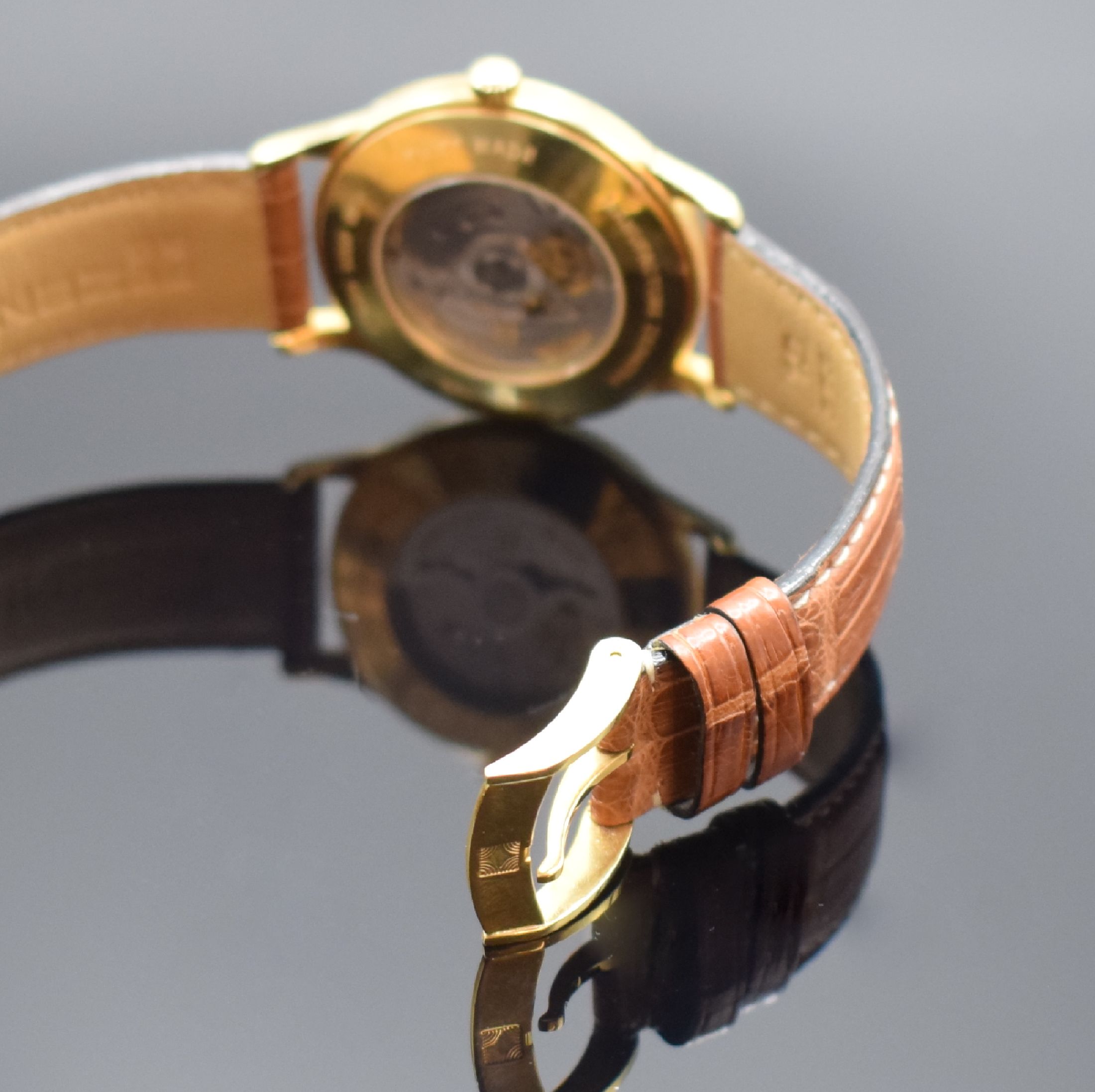 Detail b: ZENITH Elite Herrenarmbanduhr in GG 750/000 Referenz 30.0125.680, Schweiz um 1995, Automatik, beids. vergl. Geh., Boden aufgedr., orig. Lederband m. ...