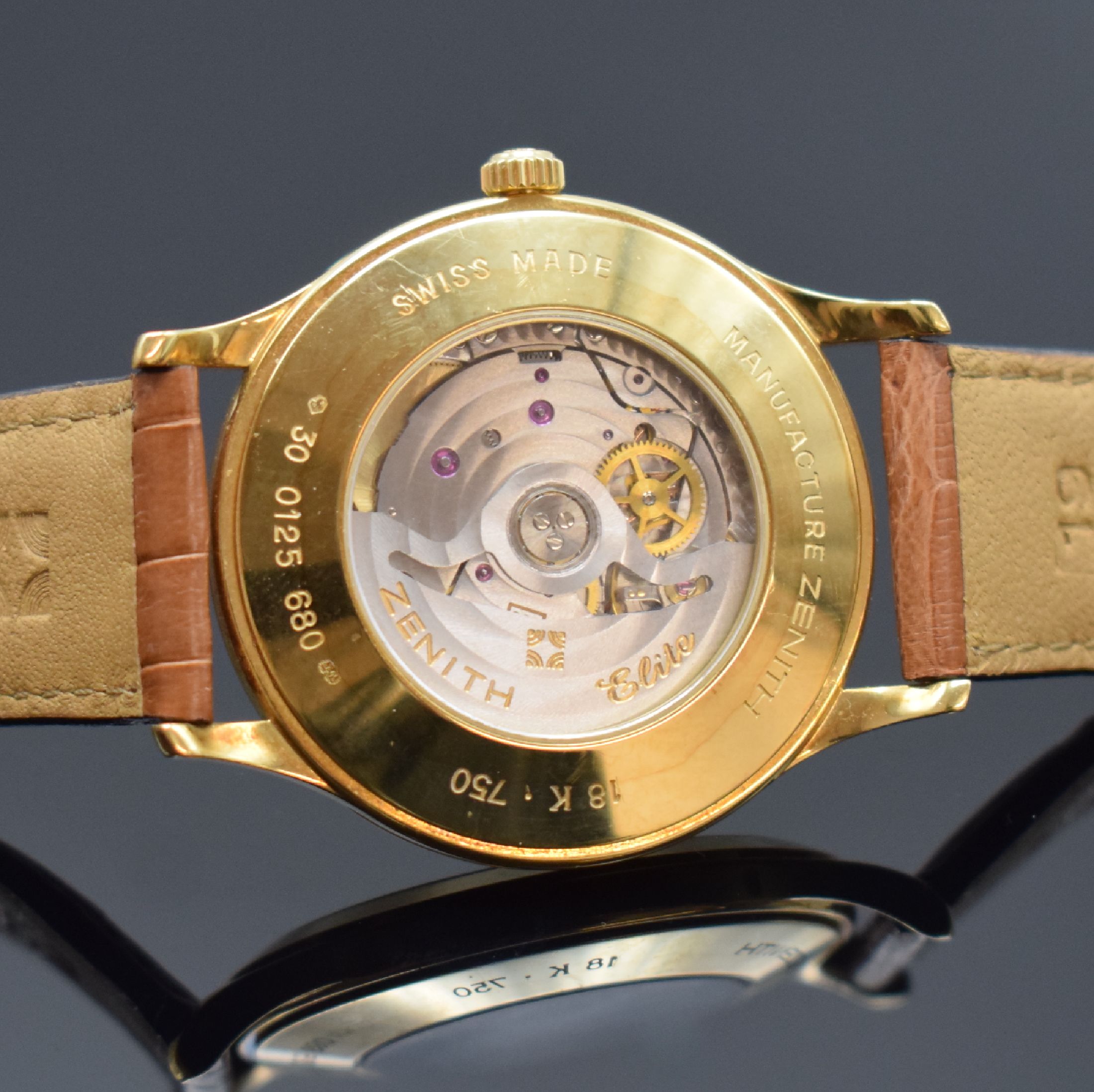 Detail e: ZENITH Elite Herrenarmbanduhr in GG 750/000 Referenz 30.0125.680, Schweiz um 1995, Automatik, beids. vergl. Geh., Boden aufgedr., orig. Lederband m. ...