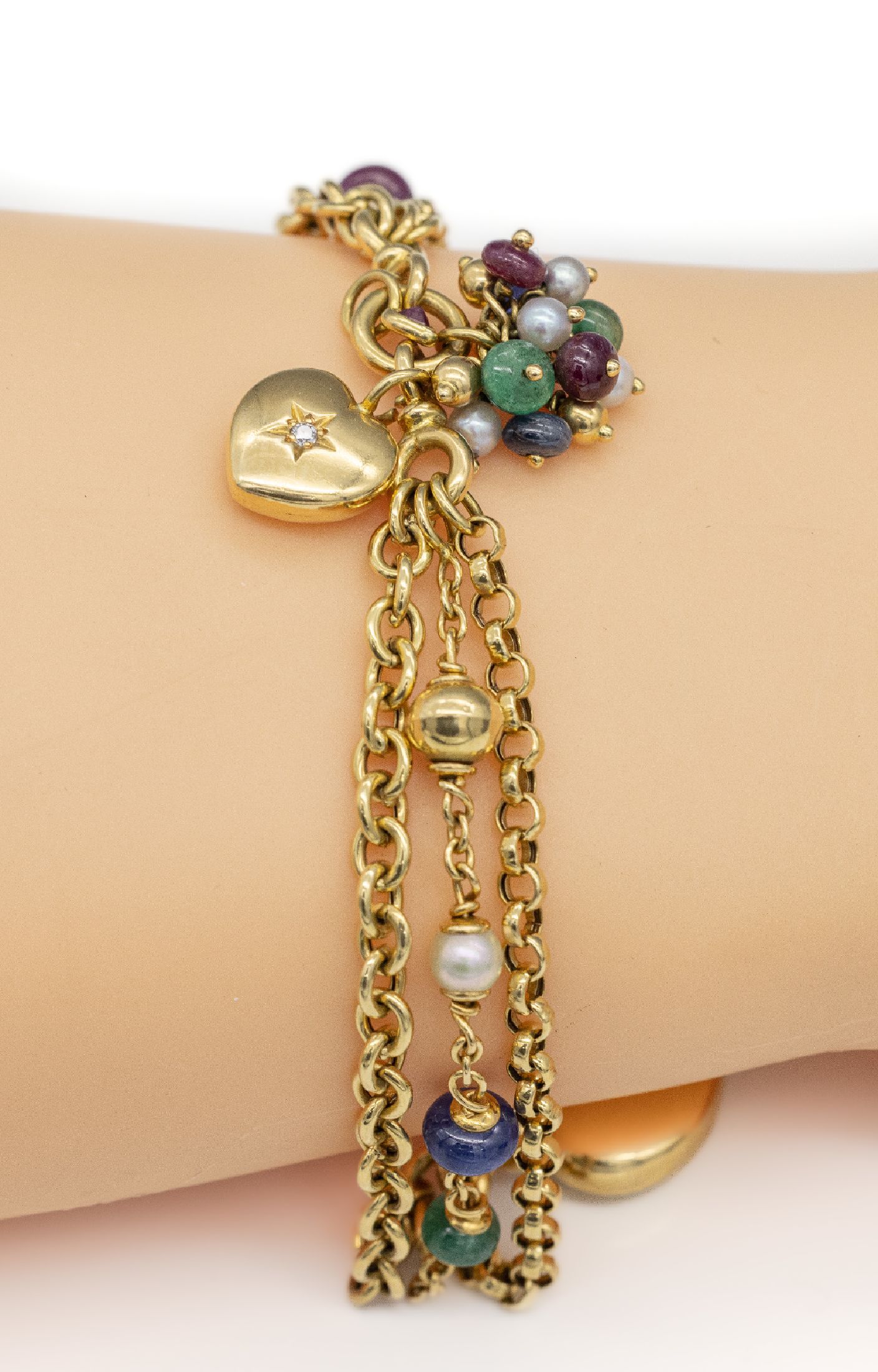 Detail a: 14 kt Gold Farbstein-Armband, GG 585/000, Rubine, Saphire und Smaragde zus. ca. 2.00 ct,Herze mit Brillanten zus. ca. 0.10 ct Weiß/vs-si, ...