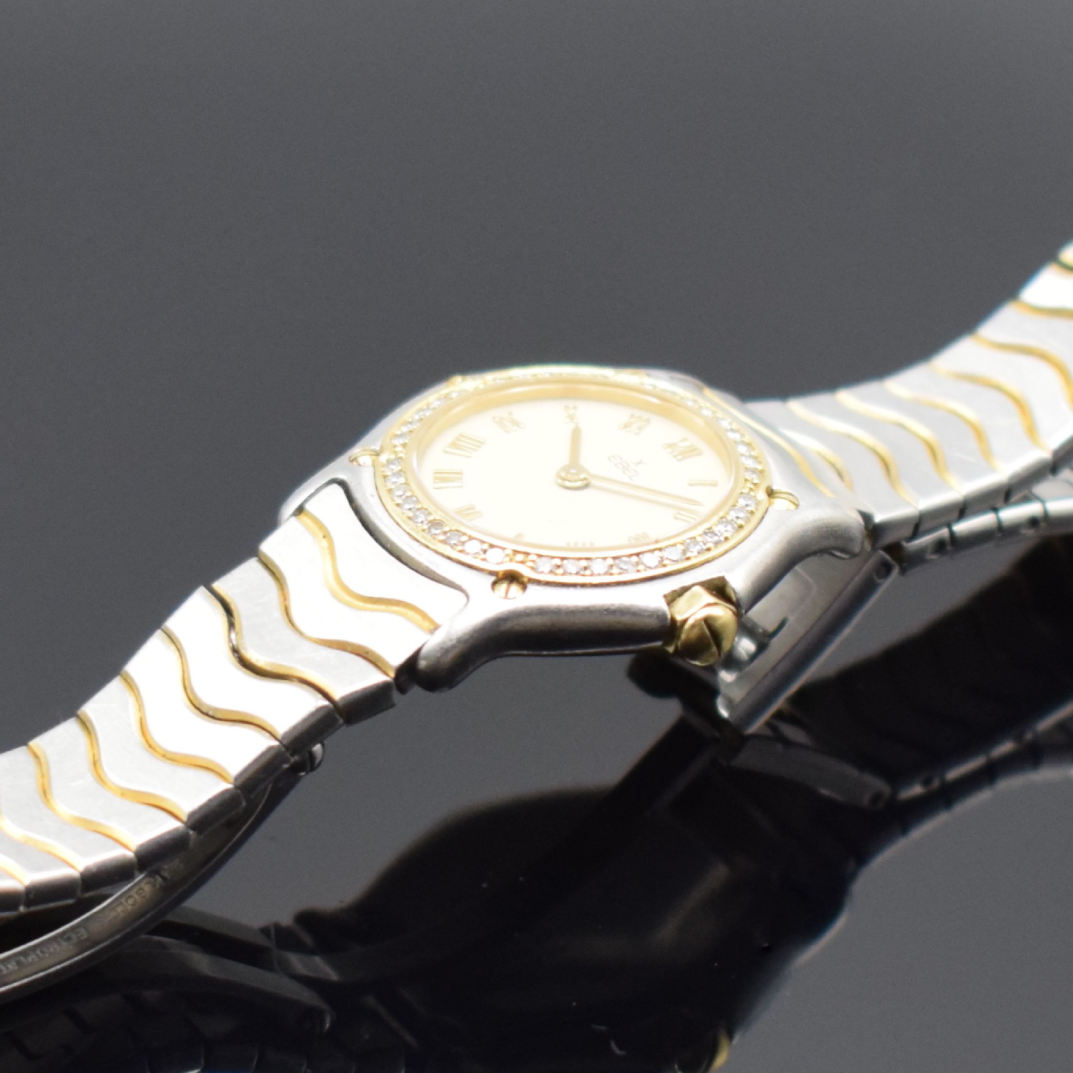 Detail c: EBEL Sport Classique Damenarmbanduhr Referenz 1057902, Schweiz um 1995, quarz, Edelstahl & Gold komb., Lünette m. Diamanten bes., cremefarb. ...