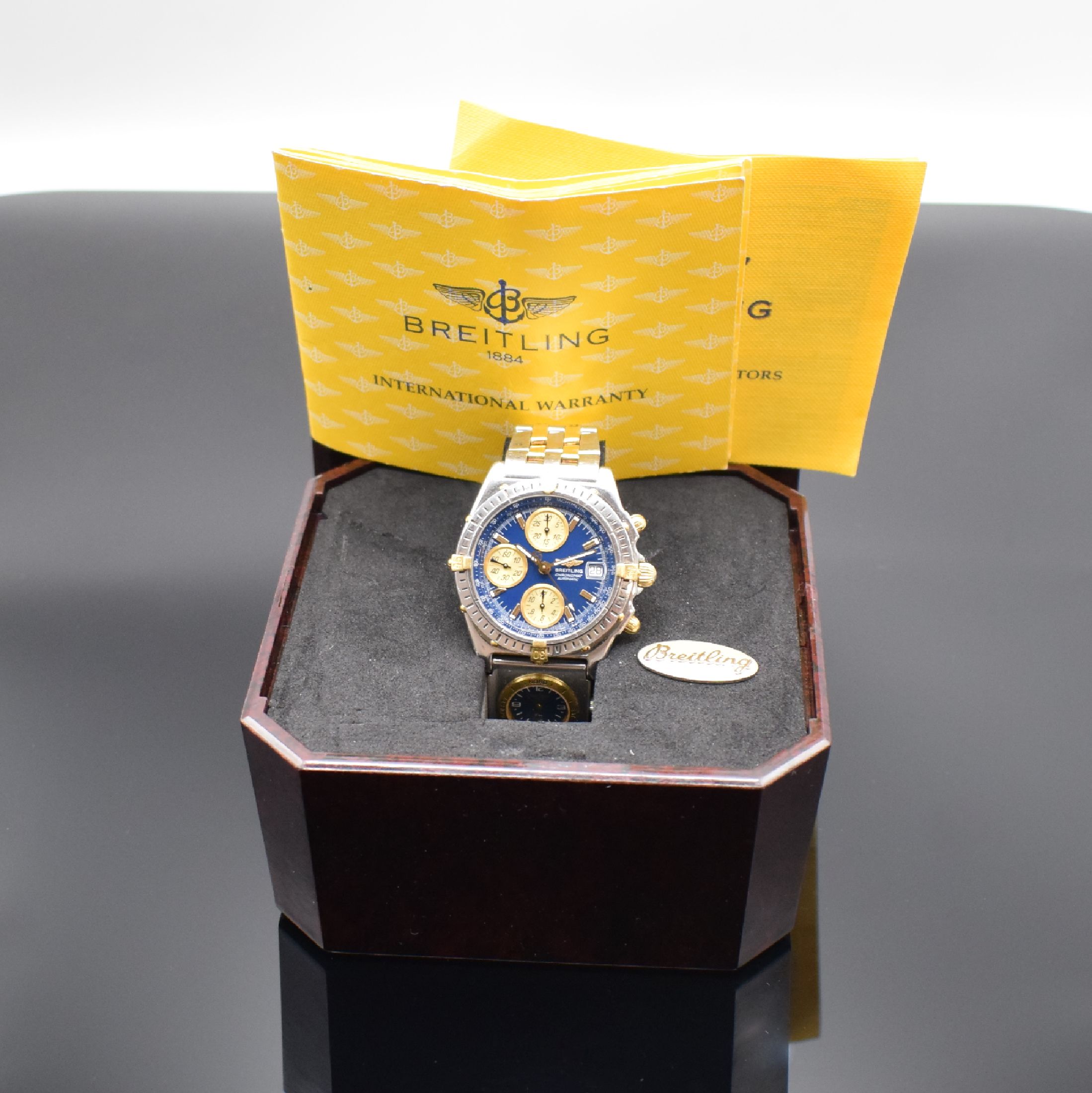 Detail e: BREITLING Armbandchronograph Serie Chronomat Referenz B13050.1, Schweiz um 1998, Automatik, Edelstahl & Gold komb. inkl. orig. Gliederband m. zus. ...