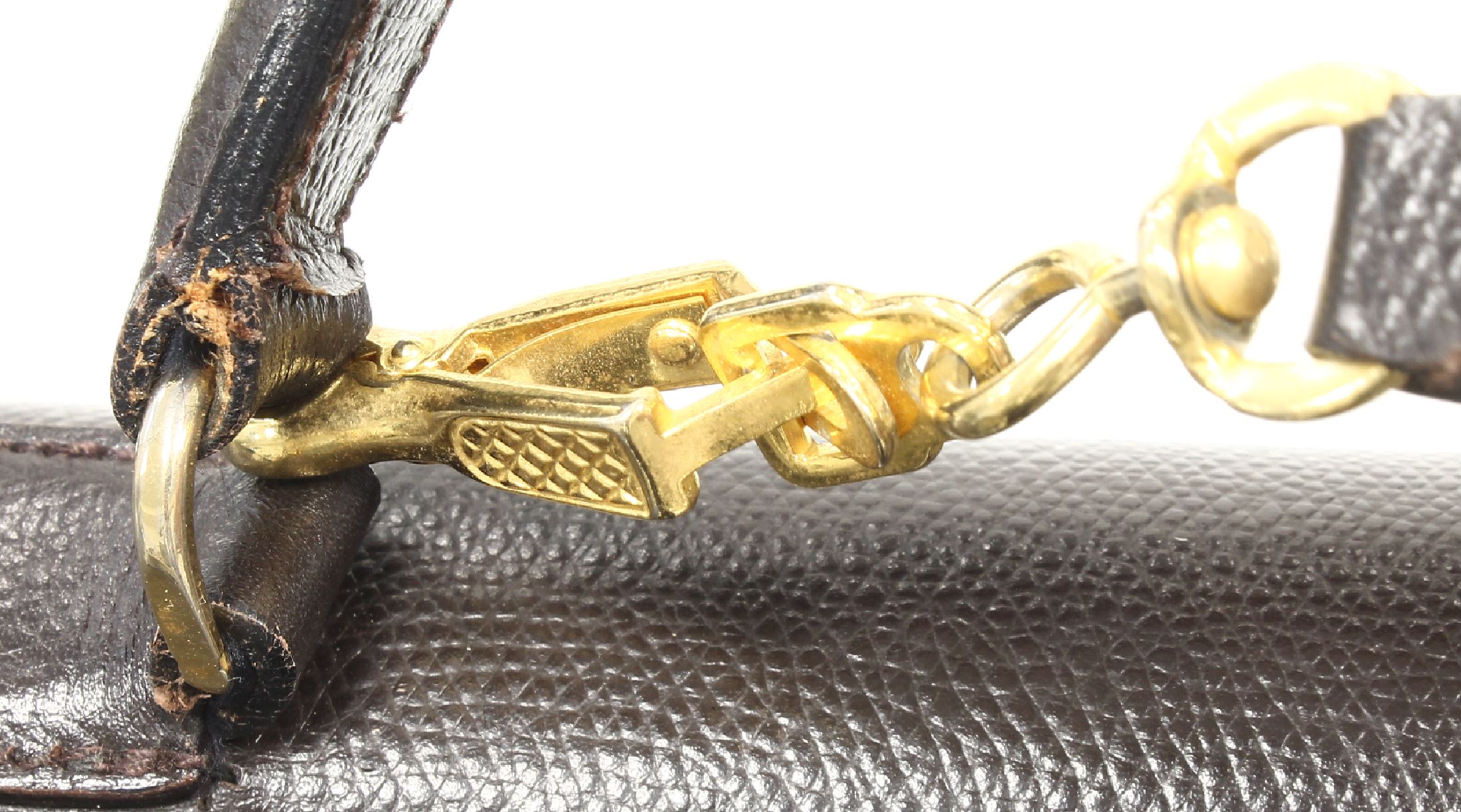 Detail e: HERMES Kelly Bag, dunkelbraunes Leder, goldfarb. Hardware, Tragehenkel, Überschlag mit Verschlußgürtel, großes Hauptfach mit ...