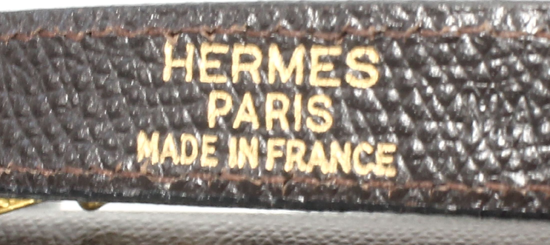 Detail f: HERMES Kelly Bag, dunkelbraunes Leder, goldfarb. Hardware, Tragehenkel, Überschlag mit Verschlußgürtel, großes Hauptfach mit ...
