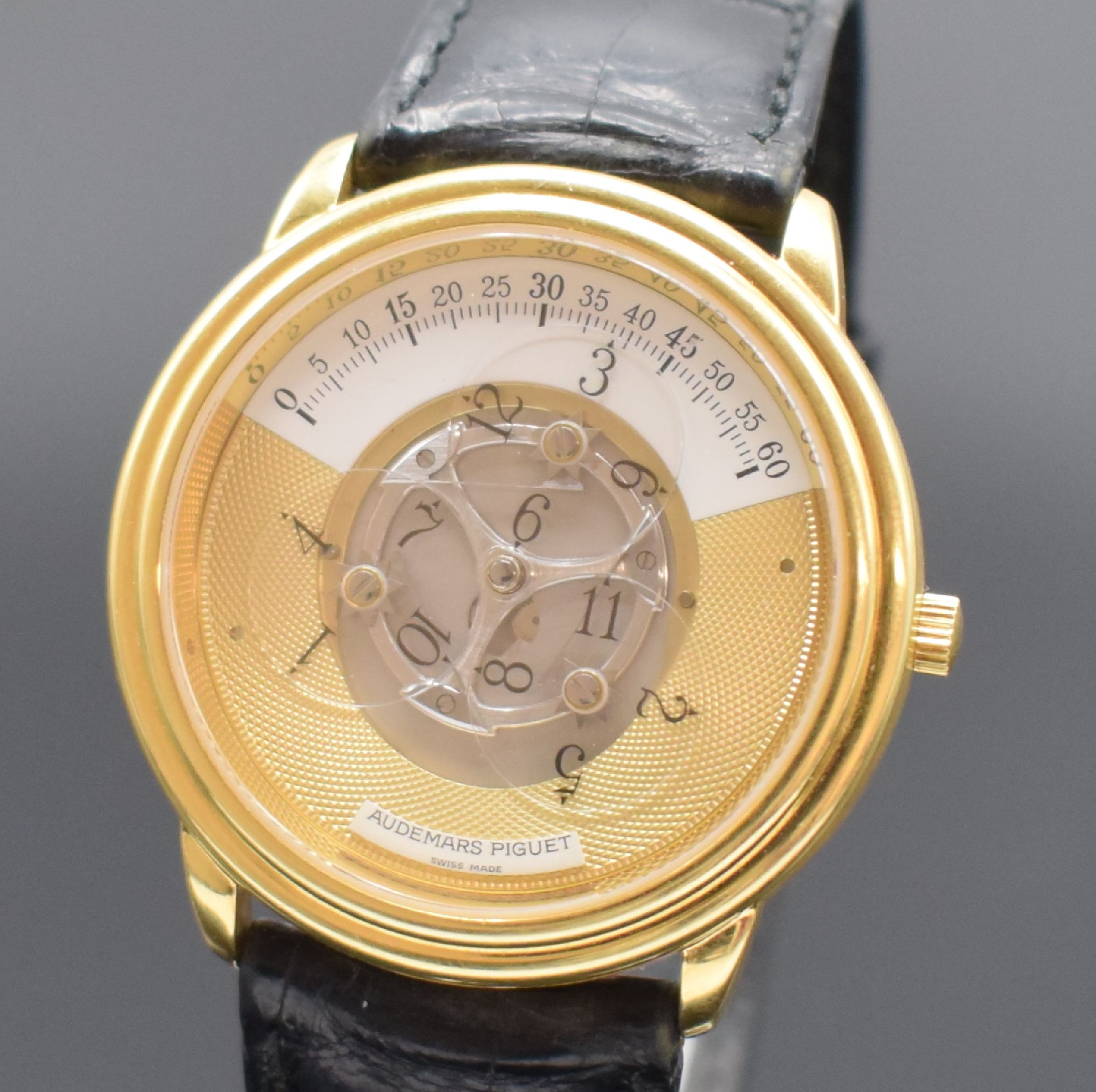 Detail a: AUDEMARS PIGUET seltene & außergewöhnliche Herrenarmbanduhr Star Wheel in GG 750/000, Automatik, Schweiz um 1995, beids. vergl. Geh., Boden & ...