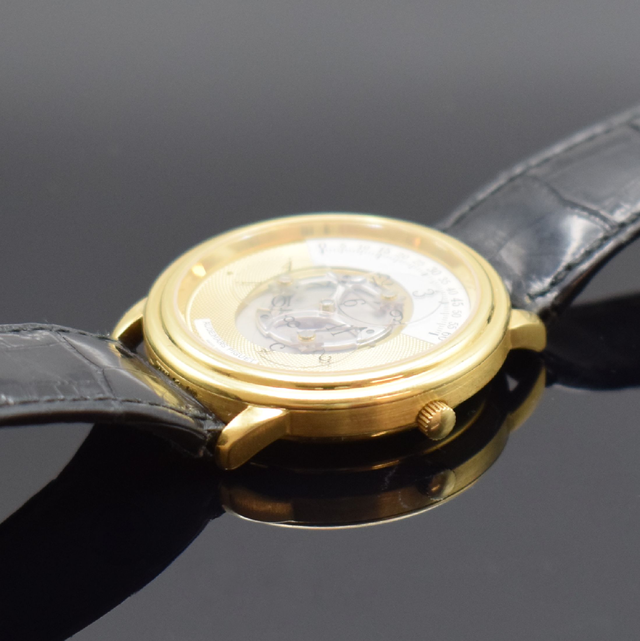 Detail c: AUDEMARS PIGUET seltene & außergewöhnliche Herrenarmbanduhr Star Wheel in GG 750/000, Automatik, Schweiz um 1995, beids. vergl. Geh., Boden & ...