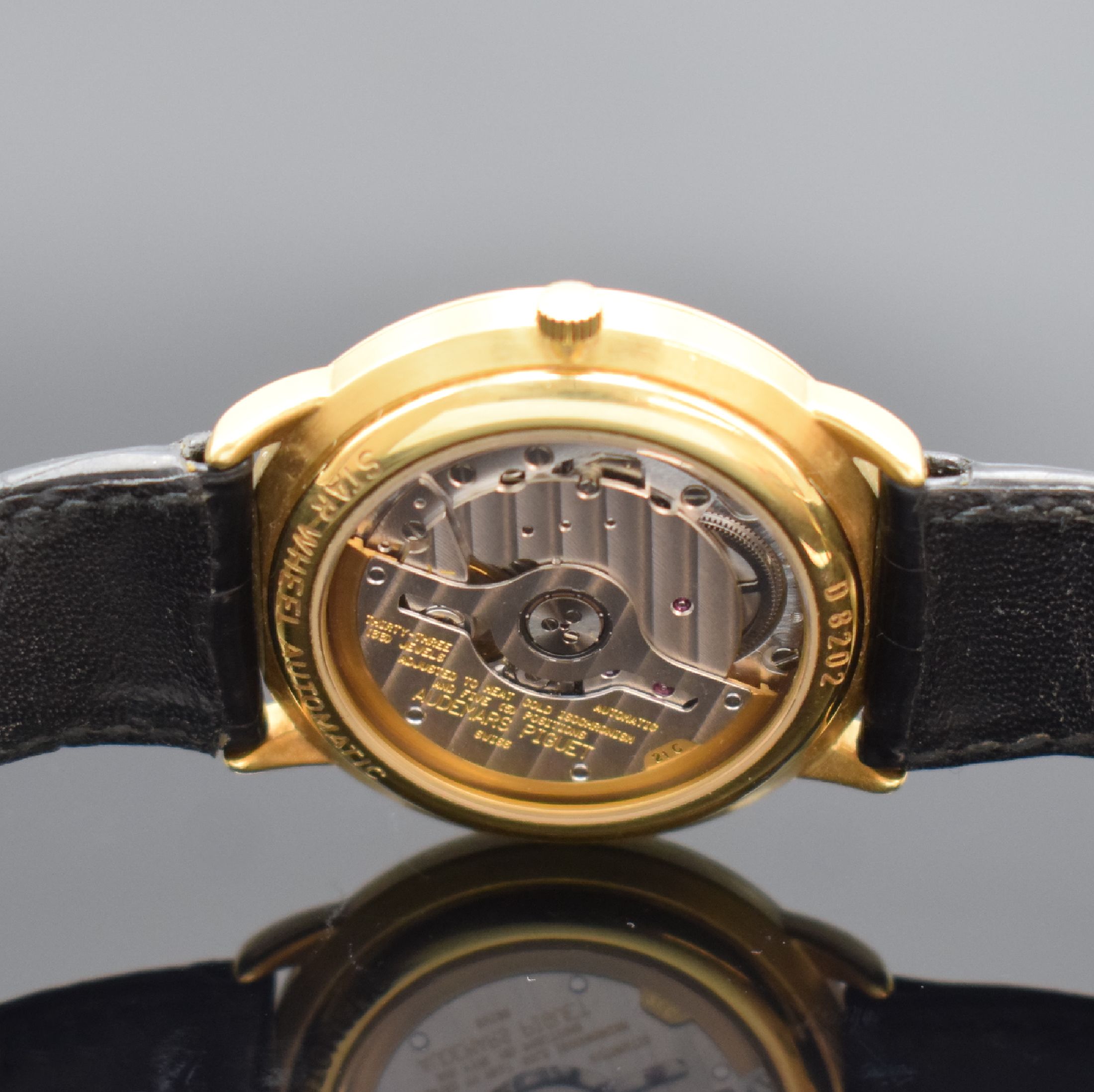 Detail e: AUDEMARS PIGUET seltene & außergewöhnliche Herrenarmbanduhr Star Wheel in GG 750/000, Automatik, Schweiz um 1995, beids. vergl. Geh., Boden & ...