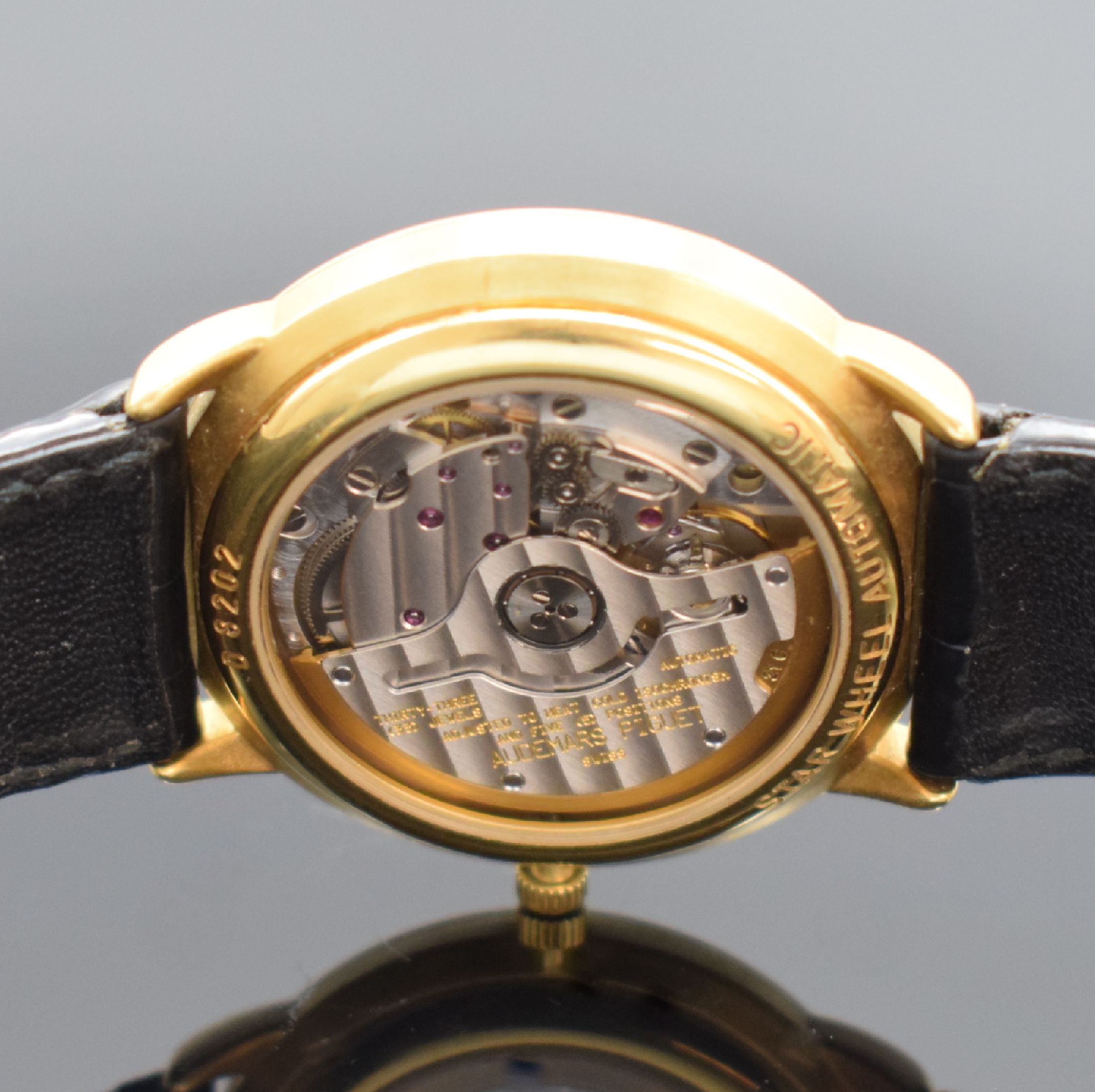 Detail f: AUDEMARS PIGUET seltene & außergewöhnliche Herrenarmbanduhr Star Wheel in GG 750/000, Automatik, Schweiz um 1995, beids. vergl. Geh., Boden & ...