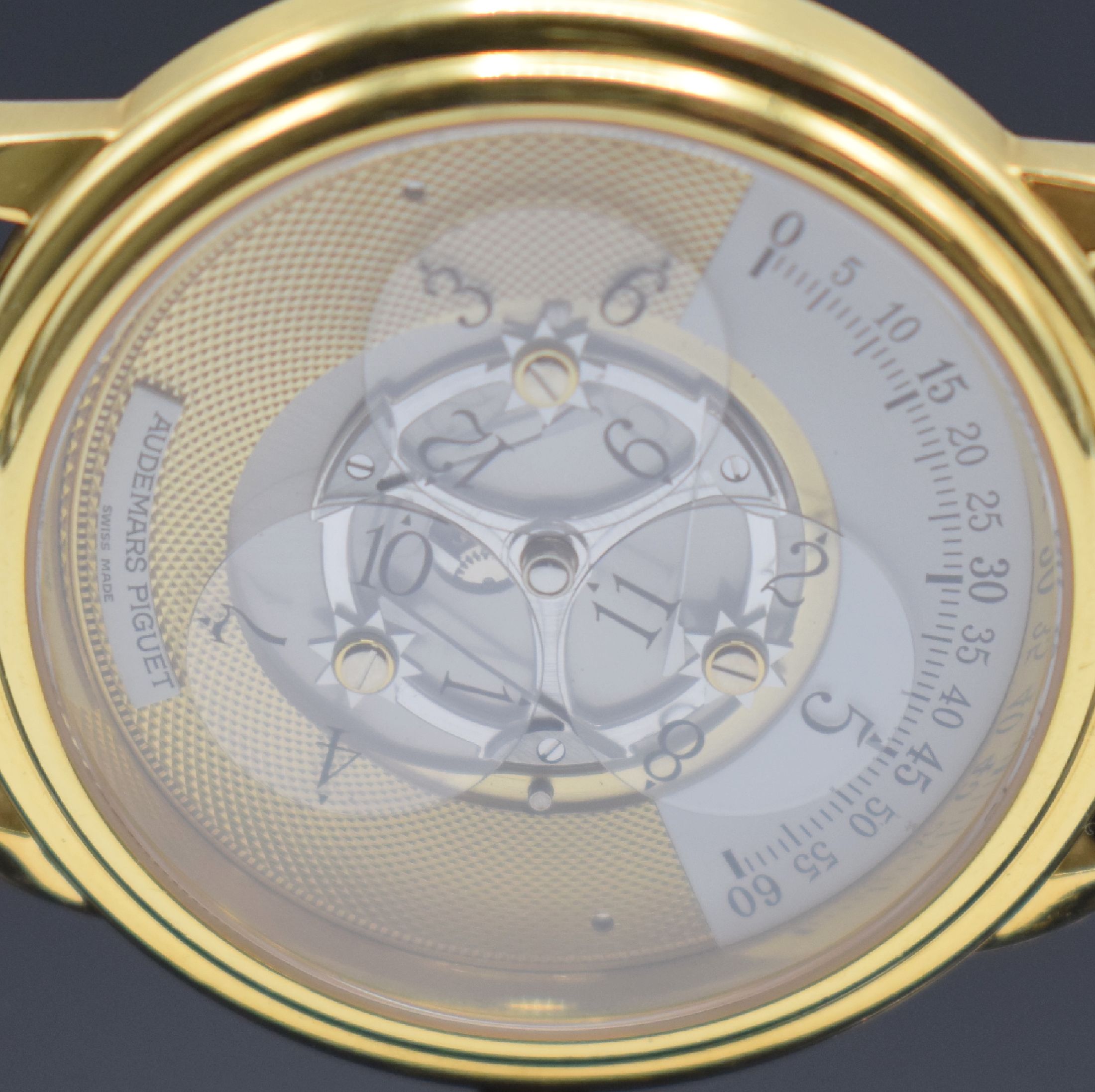 Detail i: AUDEMARS PIGUET seltene & außergewöhnliche Herrenarmbanduhr Star Wheel in GG 750/000, Automatik, Schweiz um 1995, beids. vergl. Geh., Boden & ...