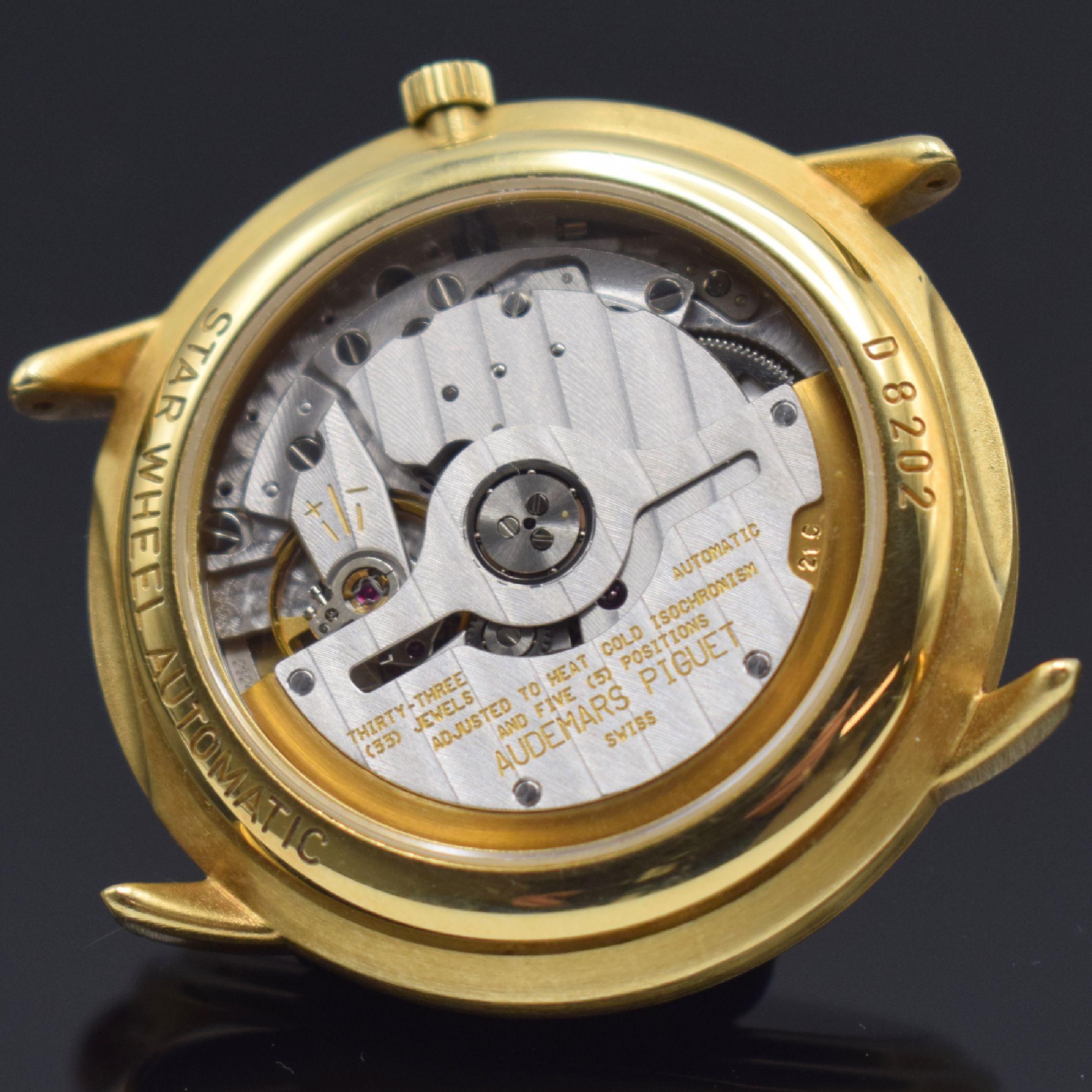 Detail j: AUDEMARS PIGUET seltene & außergewöhnliche Herrenarmbanduhr Star Wheel in GG 750/000, Automatik, Schweiz um 1995, beids. vergl. Geh., Boden & ...