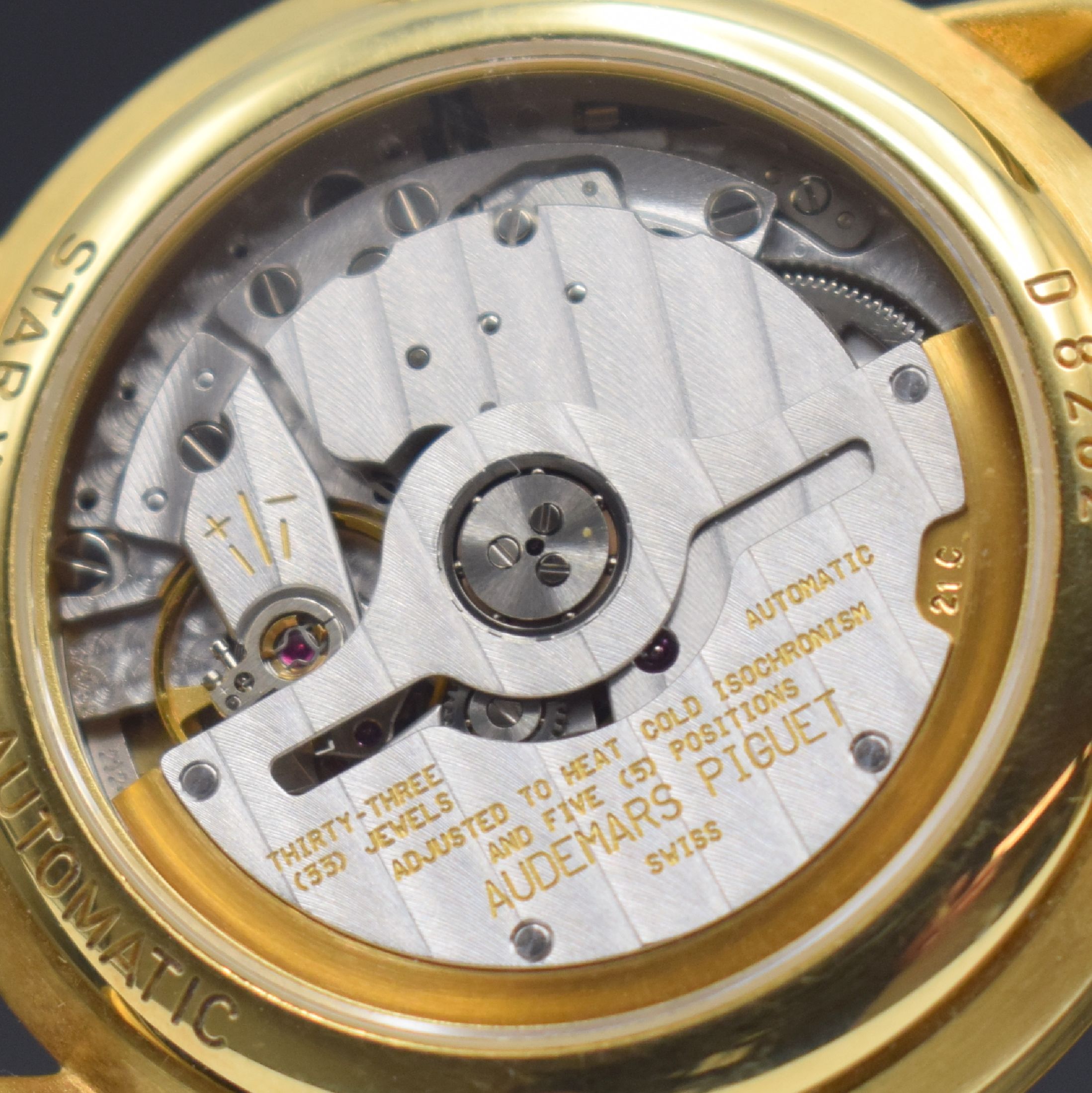 Detail k: AUDEMARS PIGUET seltene & außergewöhnliche Herrenarmbanduhr Star Wheel in GG 750/000, Automatik, Schweiz um 1995, beids. vergl. Geh., Boden & ...
