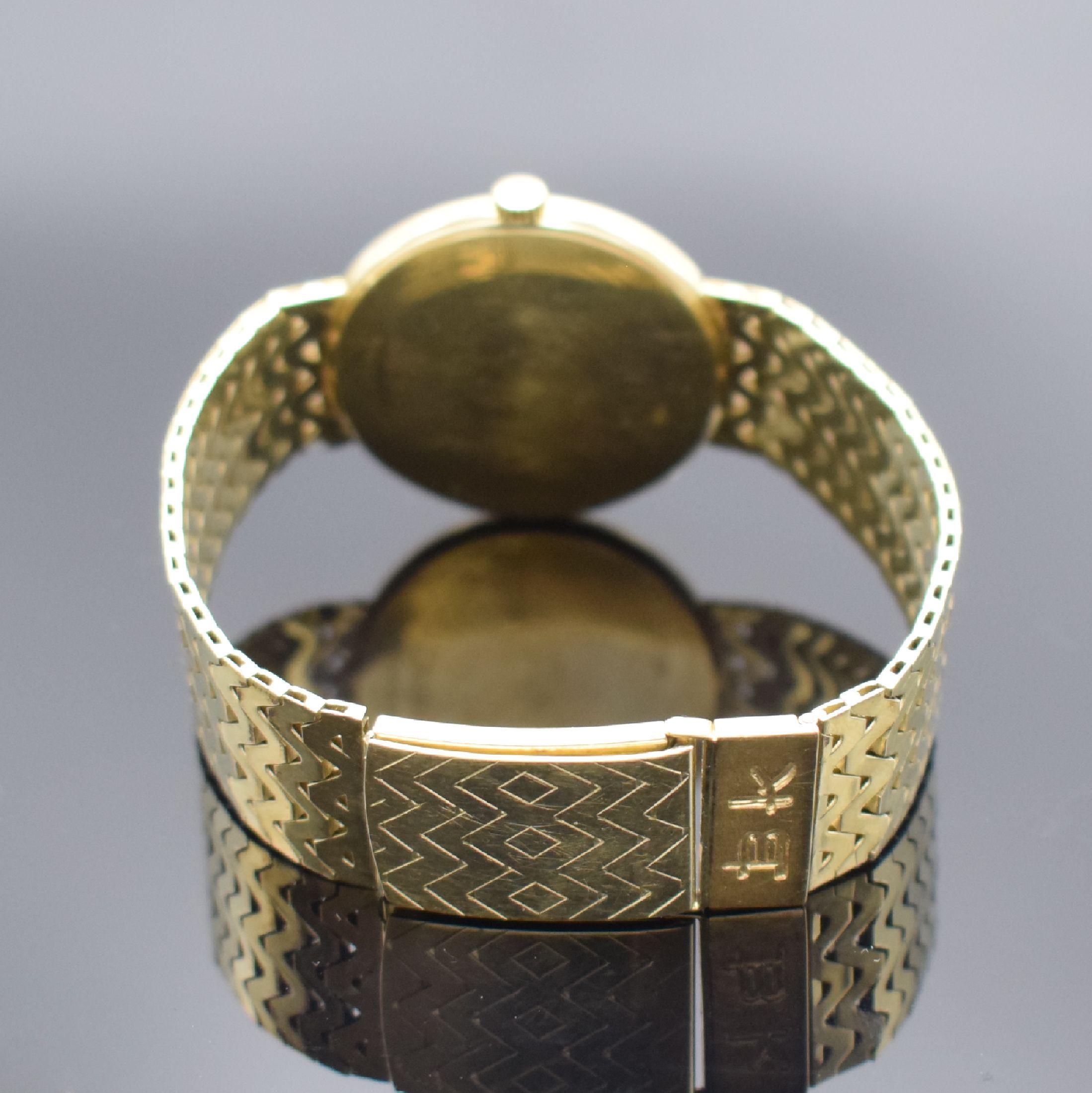 Detail b: ROXY Armbanduhr in GG 585/000, Handaufzug, Schweiz um 1965, Boden aufgedr., Goldband an der Schließe m. Monogramm BK, champagnerfarb. Zifferbl., ...