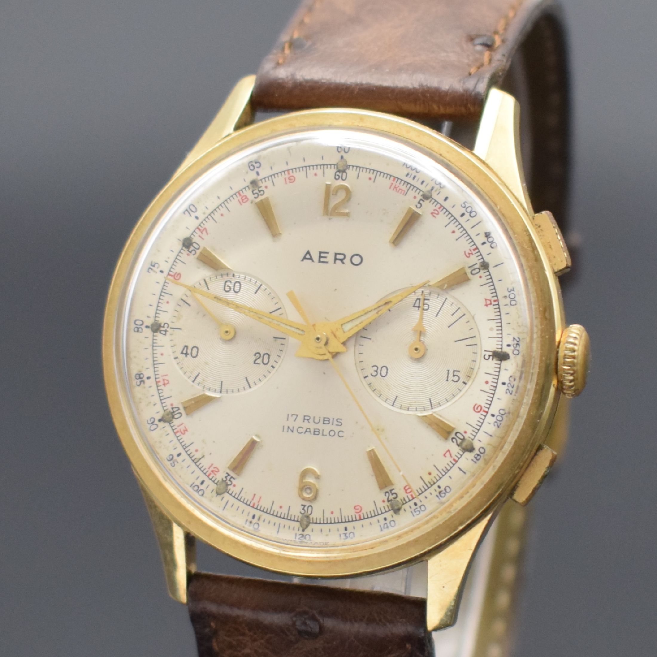 Detail a: AERO Armbandchronograph in GG 585/000, Schweiz um 1950, Handaufzug, 4-teil. Geh., Boden, Glasrand & Metallcuv. aufgedr., silb. Zifferbl. m. aufges. ...