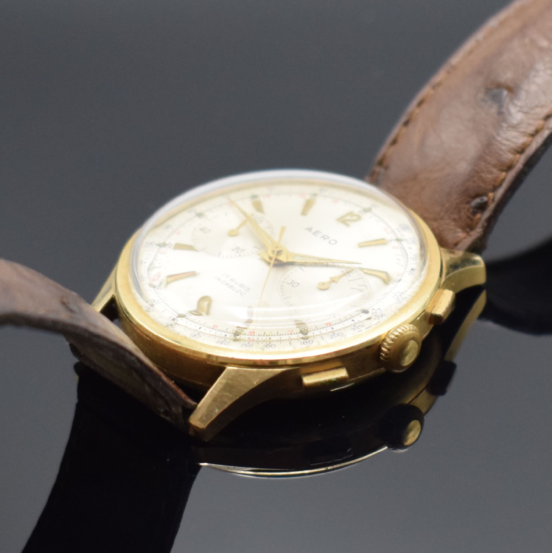 Detail b: AERO Armbandchronograph in GG 585/000, Schweiz um 1950, Handaufzug, 4-teil. Geh., Boden, Glasrand & Metallcuv. aufgedr., silb. Zifferbl. m. aufges. ...
