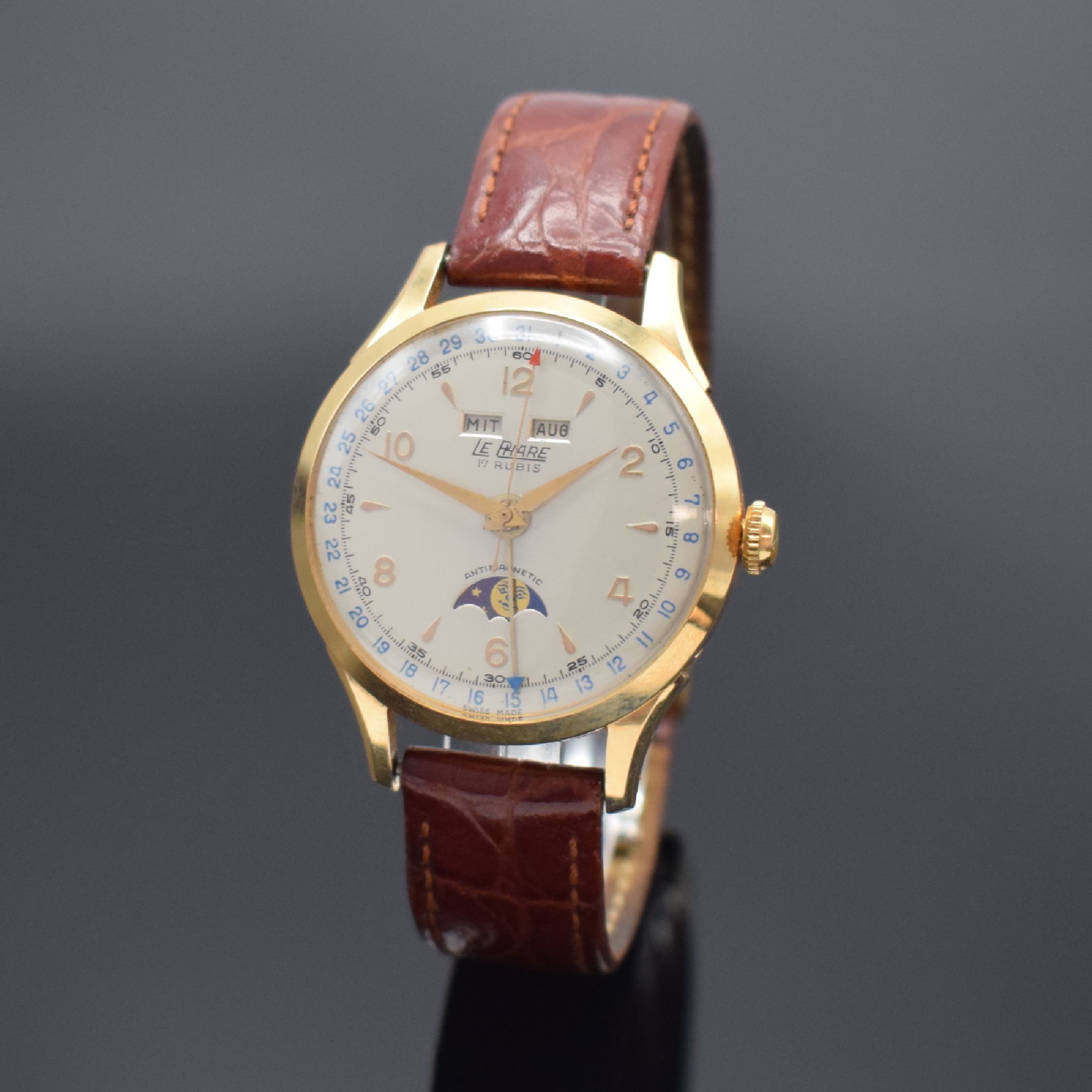 LE PHARE Herrenarmbanduhr mit Vollkalenderanzeige in Roségold 750/000, Handaufzug, Schweiz um 1950, Boden & Glasrand aufgedr., vers. Bl., Anz. v. ...