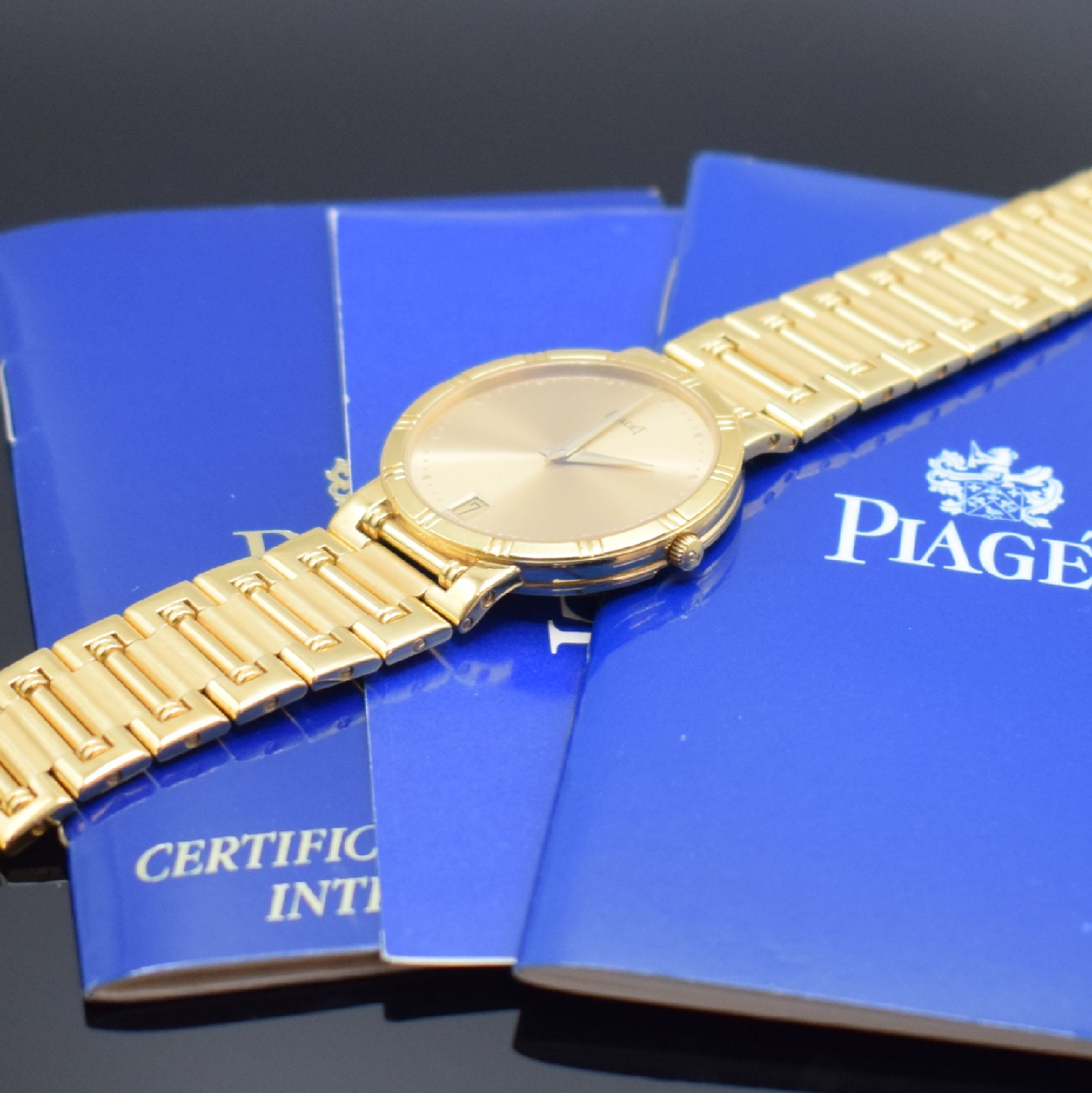 Detail e: PIAGET Dancer Herrenarmbanduhr in GG 750/000 Referenz 15123 K 81, Schweiz um 1996, quarz, 2-teil. Geh., Boden 4-fach verschr., Glieder-band m. ...