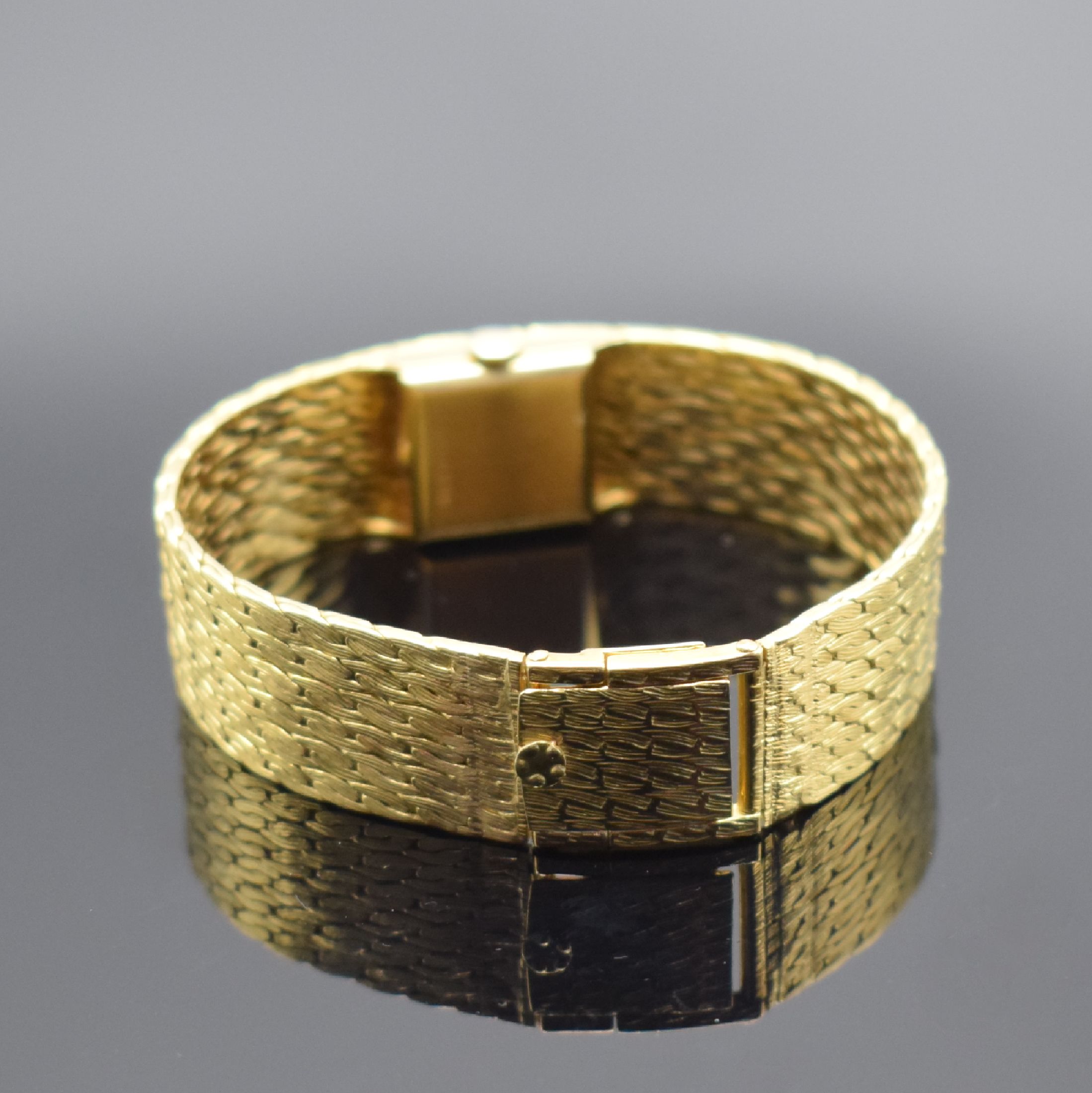 Detail b: ETERNA Damenarmbanduhr in GG 750/000, Schweiz um 1960, Handaufzug, 2-teil. Gehäuse, Boden aufgedr., Milanaiseband, silb. Zifferbl. m. aufges. gold. ...