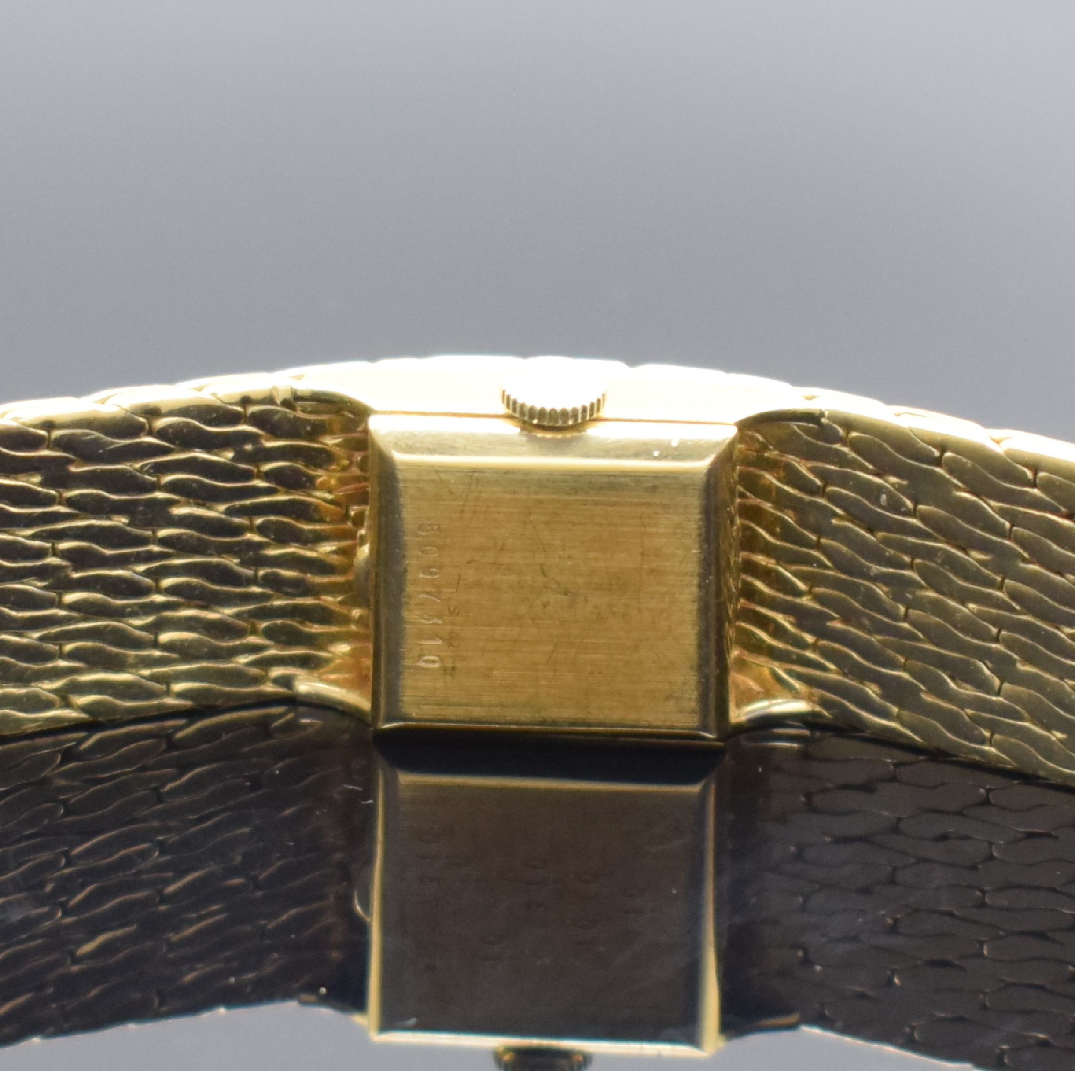 Detail d: ETERNA Damenarmbanduhr in GG 750/000, Schweiz um 1960, Handaufzug, 2-teil. Gehäuse, Boden aufgedr., Milanaiseband, silb. Zifferbl. m. aufges. gold. ...