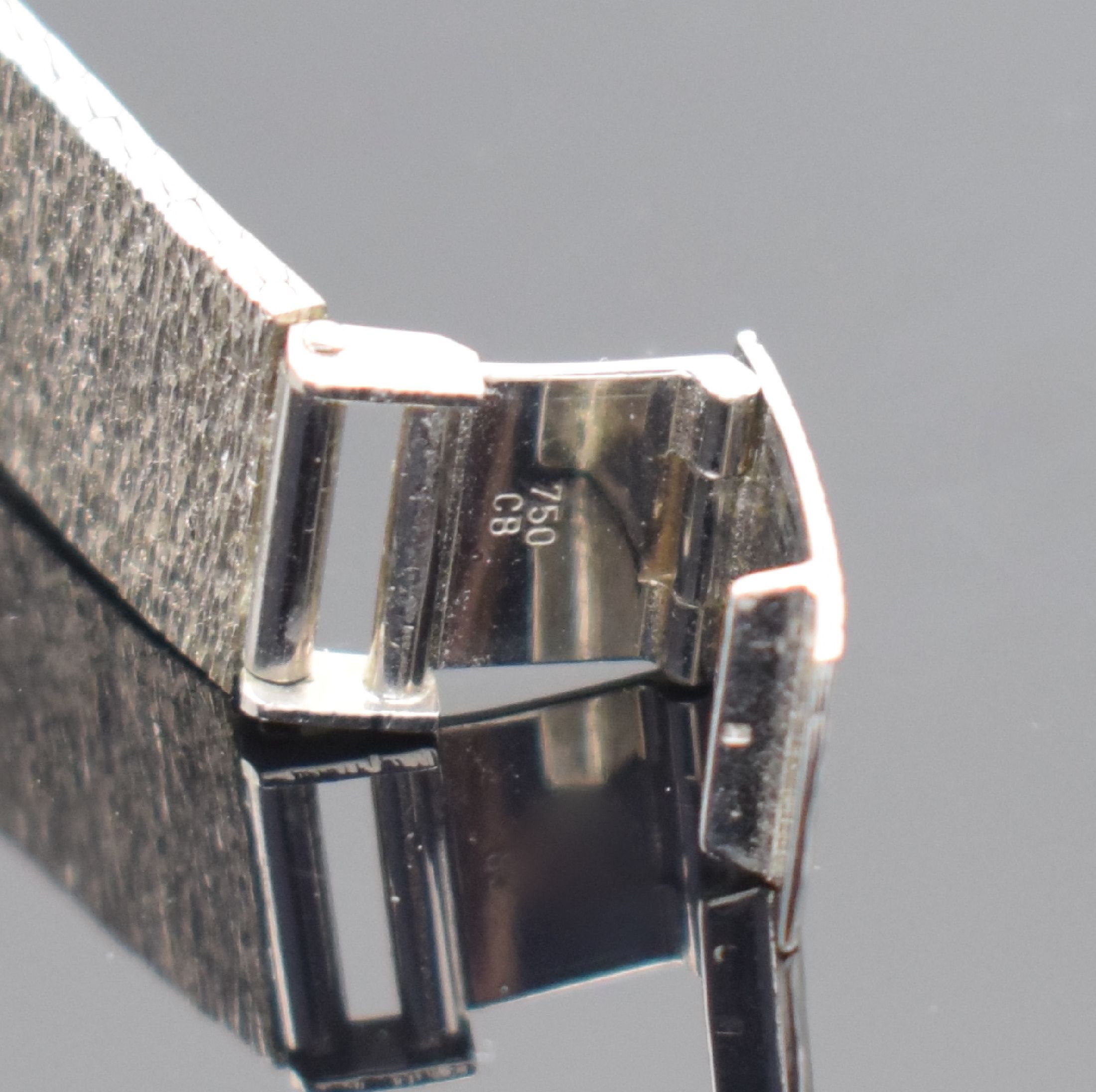 Detail b: BUCHERER Damenarmbanduhr in WG 750/000 mit Diamanten, Schweiz um 1965, Handaufzug, 2- teil. Geh., Boden aufgedr., Lünette m. Diamanten bes., silb. ...