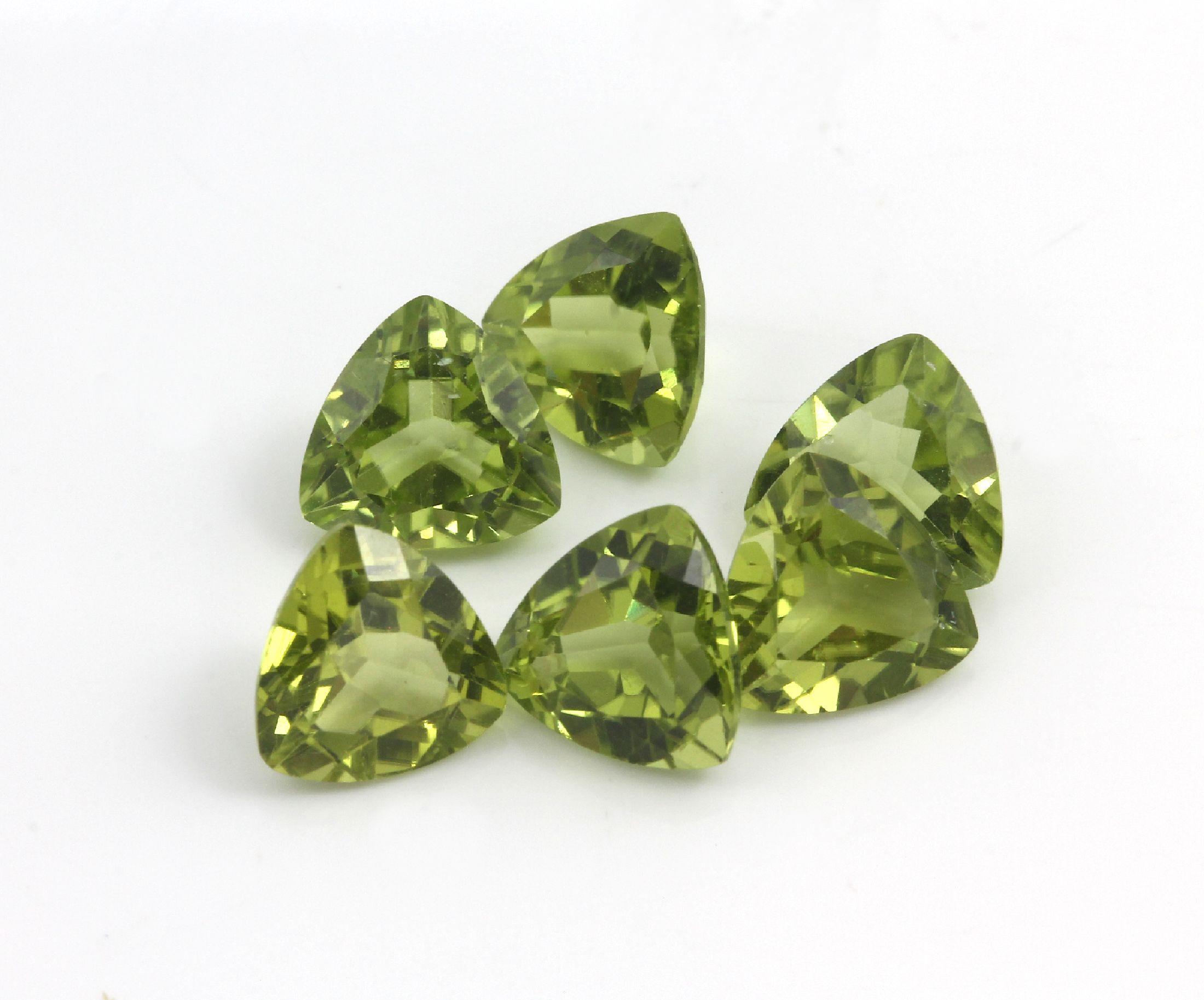 Detail a: Konvolut 6 Peridot Triangeln zus. ca. 10.9 ct