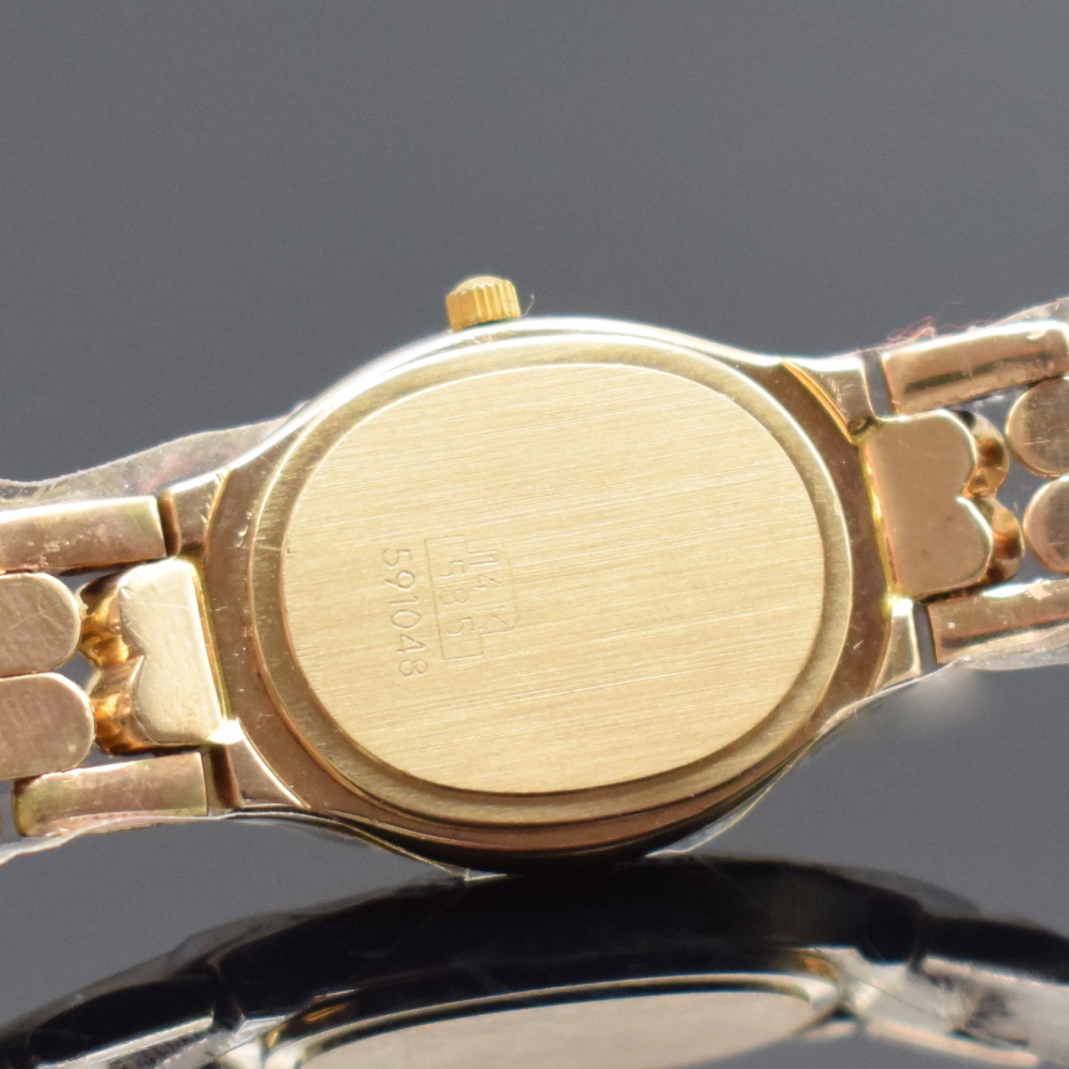 Detail b: BONARD Damenarmbanduhr in GG 585/000, Schweiz um 1985, quarz, 2-teil. Geh., Boden aufgedr., Lünette wie Bandanst. aufw. m. Brillanten bes., gold. ...