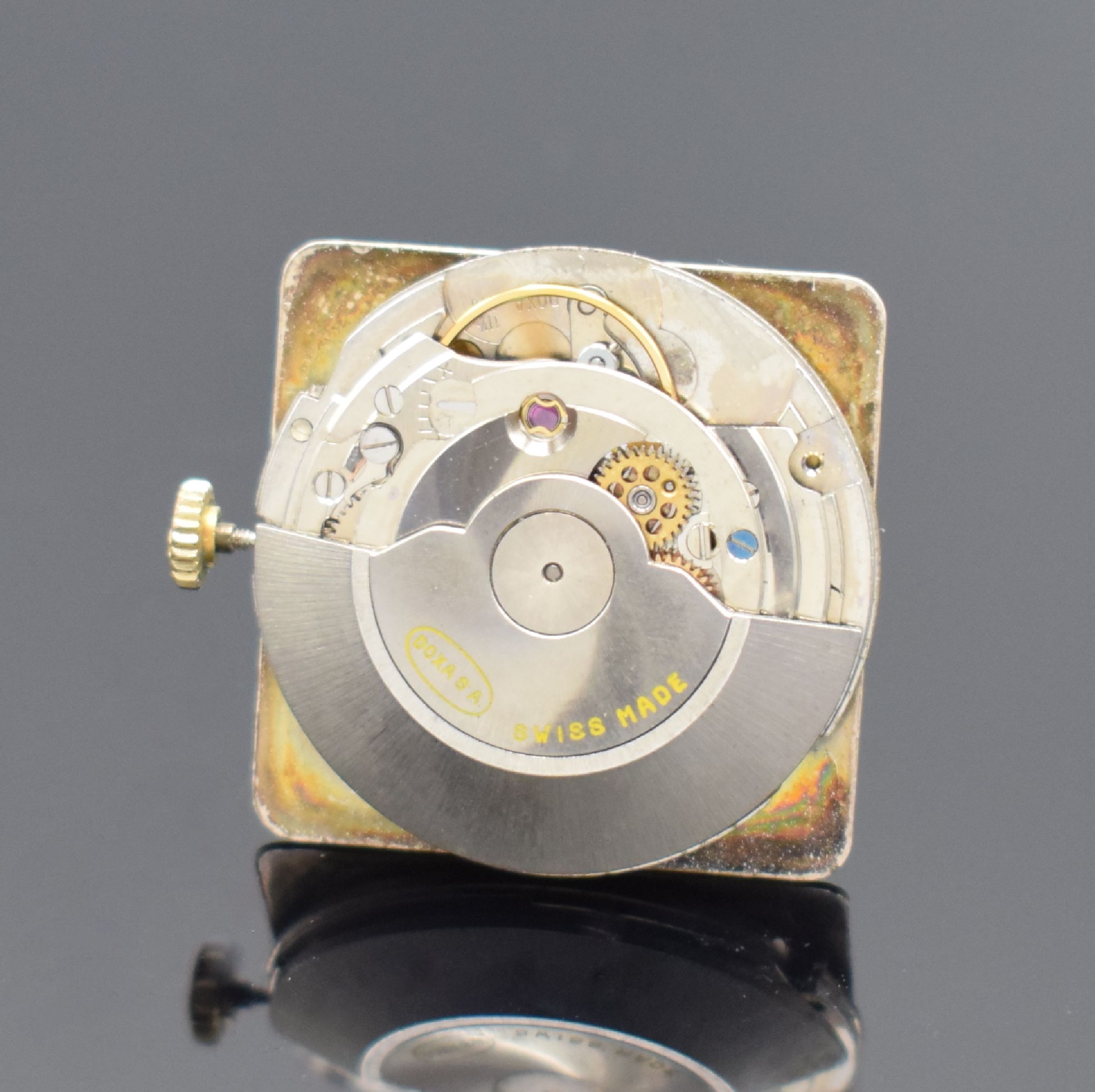 Detail e: DOXA Grafic Herrenarmbanduhr in GG 750/000, Schweiz um 1960, Automatik, 2-teil. Gehäuse, Boden aufgedr., neutr. Stahlbd. teils verg., silb. ...
