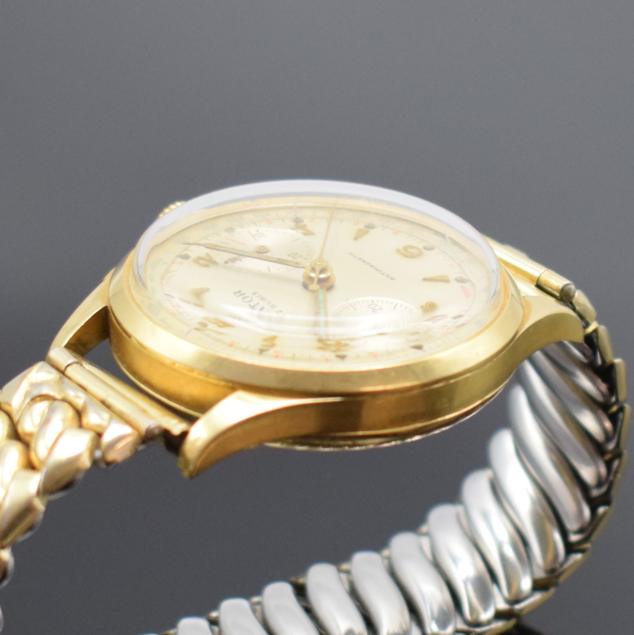 Detail b: ORATOR Herrenarmbanduhr mit Chronograph in GG 750/000, Schweiz um 1955, Handaufzug, 3- teil. Geh., Boden & Glasrand aufgedr., silb. Zifferbl. m. ...