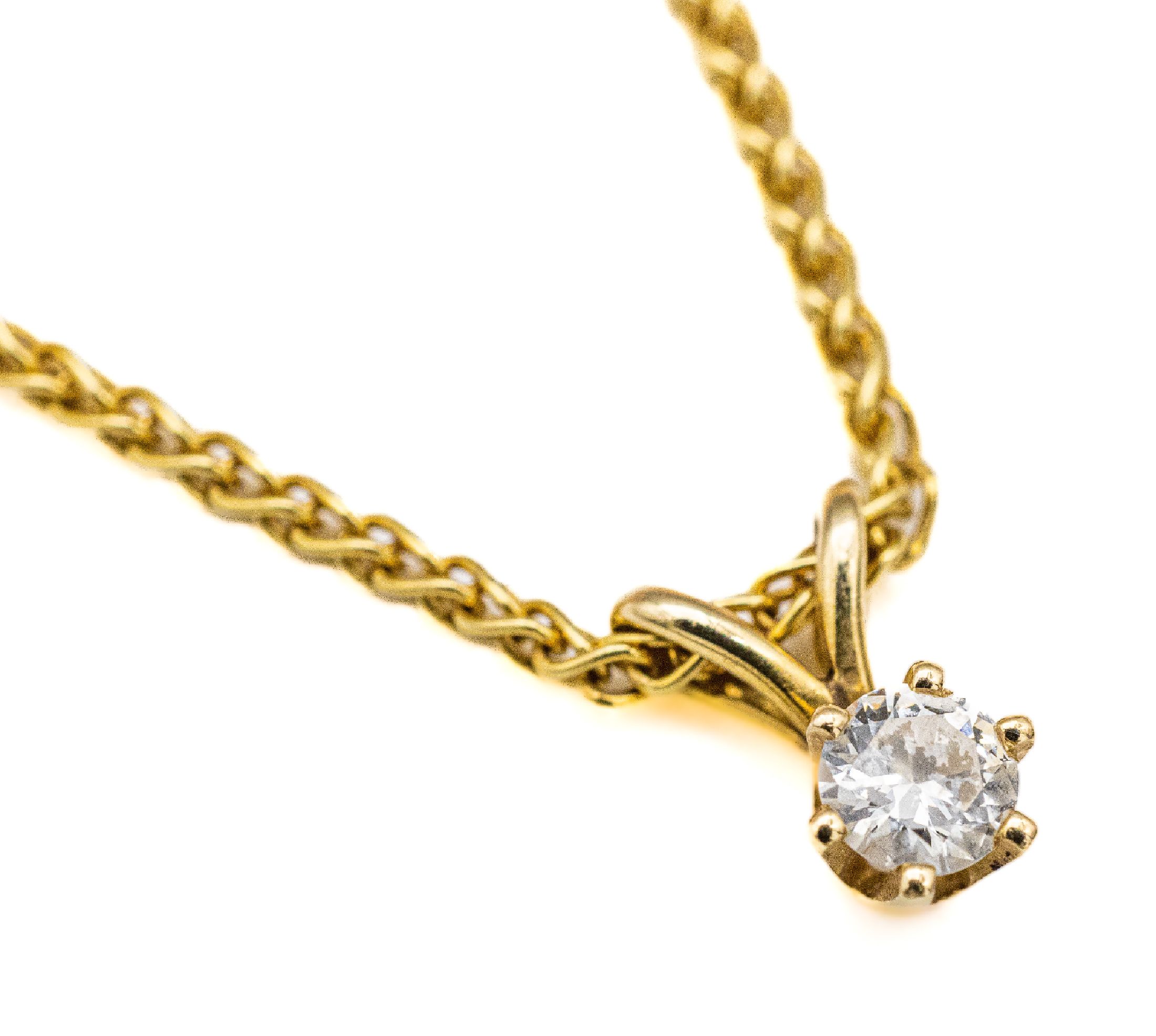 14 kt Gold Brillant-Anhänger, GG 585/000, Brillant ca. 0.10 ct Weiß/si, an Kette, GG 750/000, L. ca. 42 cm, Karabinerschließe, ca. 3.3 g
