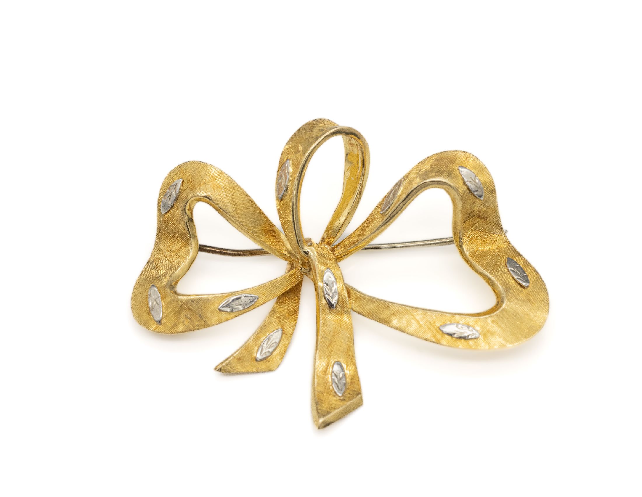18 kt Gold Brosche "Schleife", GG/WG 750/000, strukturiert, ca. 5 x 3.8 cm, ca. 6.8g