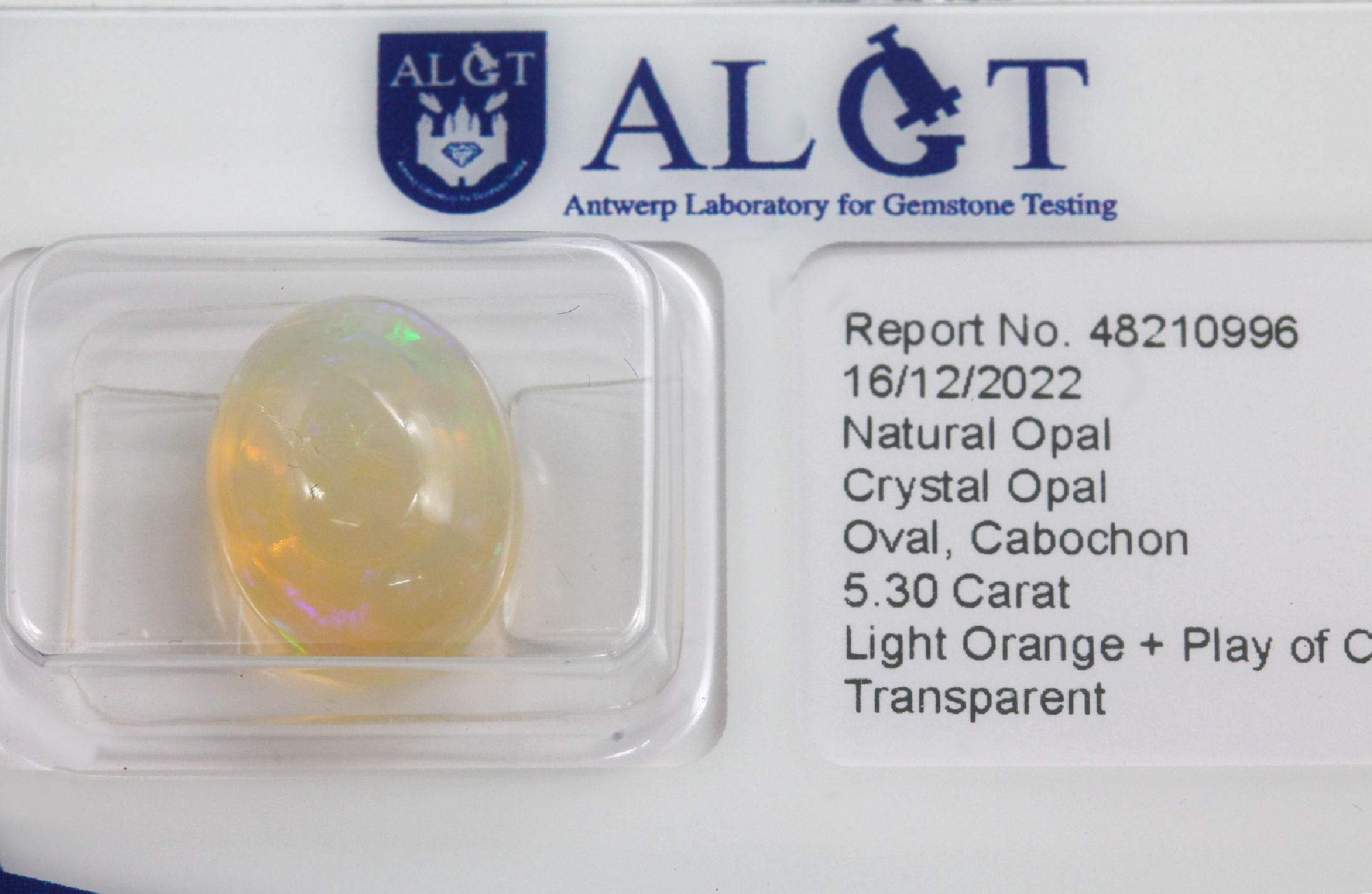 Detail a: Konvolut Farbsteine, alle mit ALGT Expertise, : 1 x loser Opalcabochon ca. 5.30 ct Light Orange, schönes Farbspiel, unbehandelt; 1 x Paar lose ...