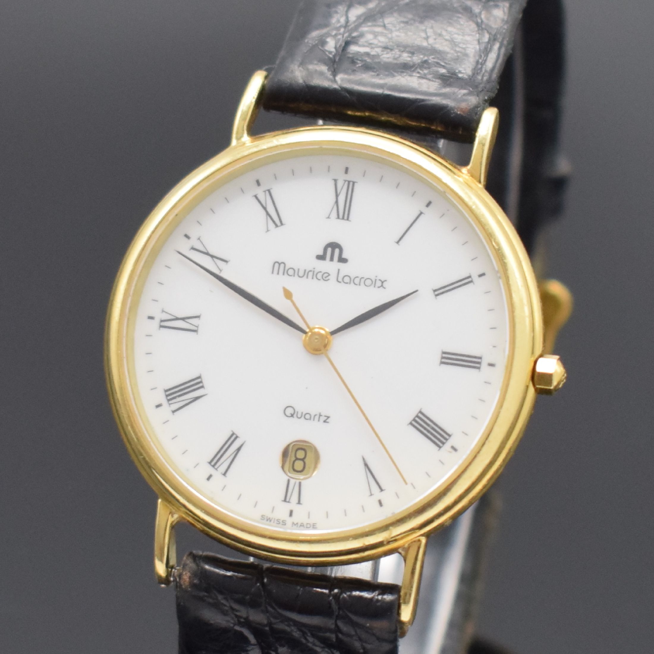 Detail a: MAURICE LACROIX Armbanduhr in GG 750/000, Schweiz um 2000, quarz, 2-teil. Geh., Boden aufgedr., orig. Lederband m. Dornschl., weißes Zifferbl. m. ...