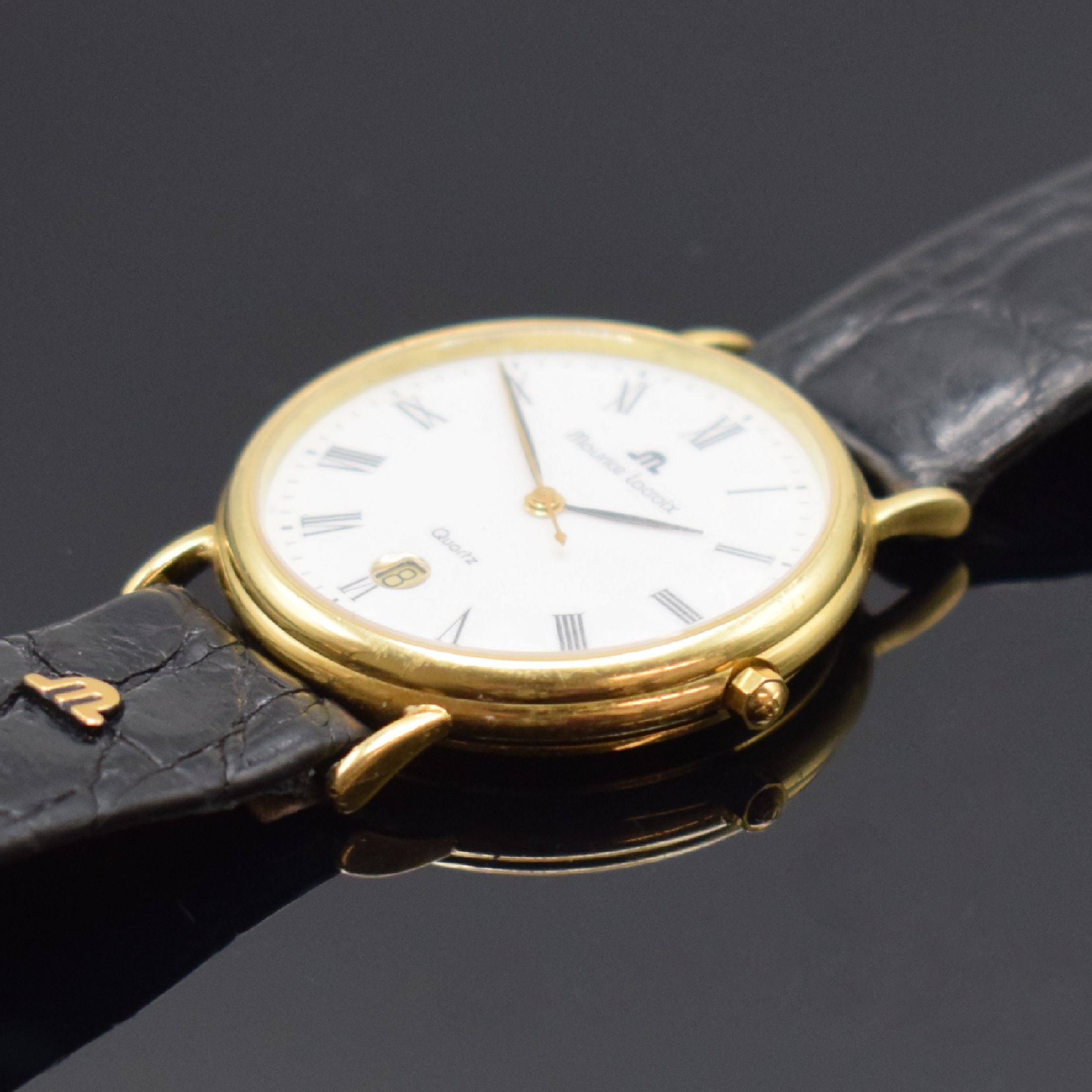 Detail b: MAURICE LACROIX Armbanduhr in GG 750/000, Schweiz um 2000, quarz, 2-teil. Geh., Boden aufgedr., orig. Lederband m. Dornschl., weißes Zifferbl. m. ...