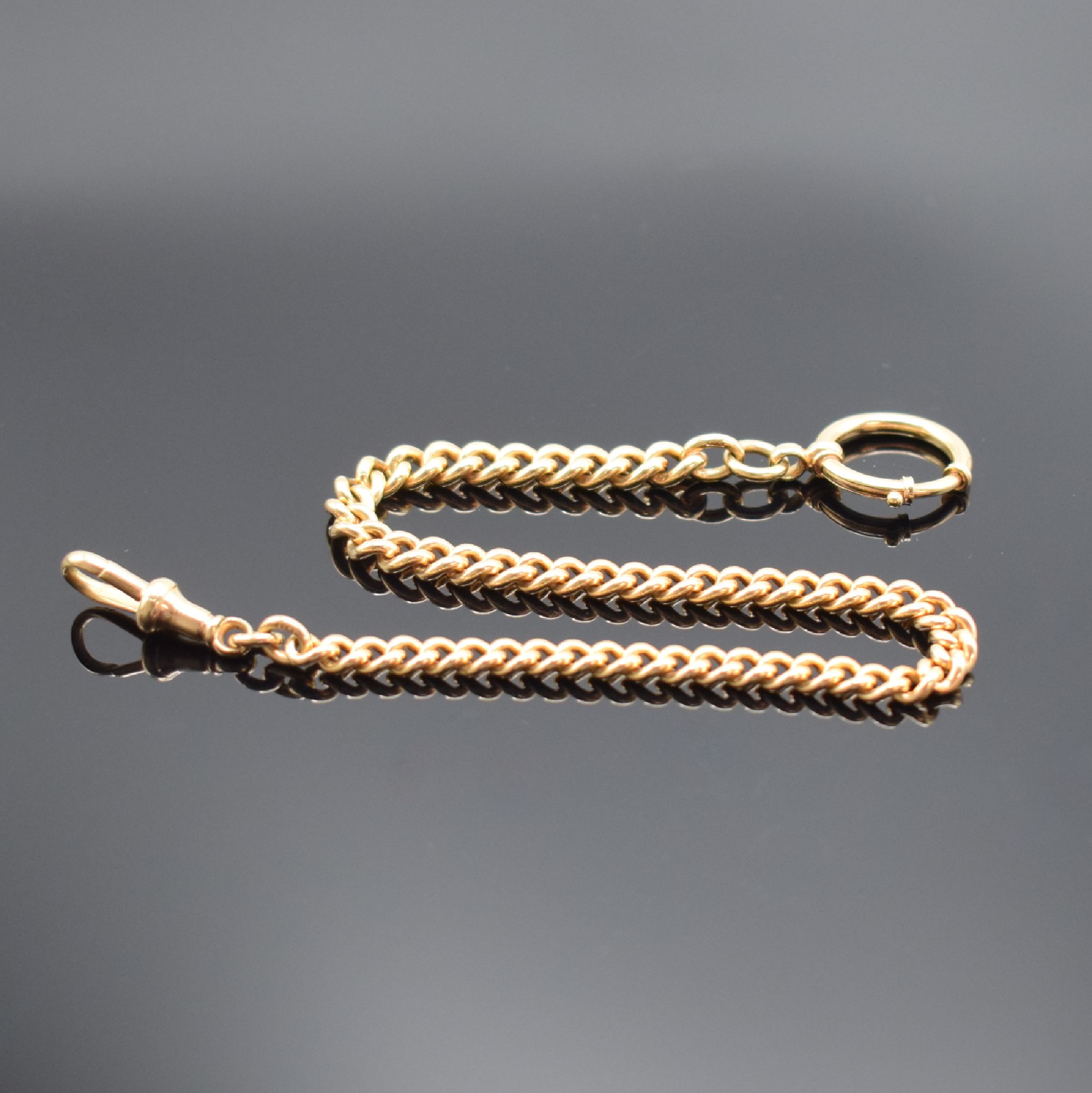 Taschenuhrkette in RoséG 333/000, m. Karabiner und Federring, L. ca. 27,5 cm, Gew. ca. 28g, in gebrauchsfähigen Zustand