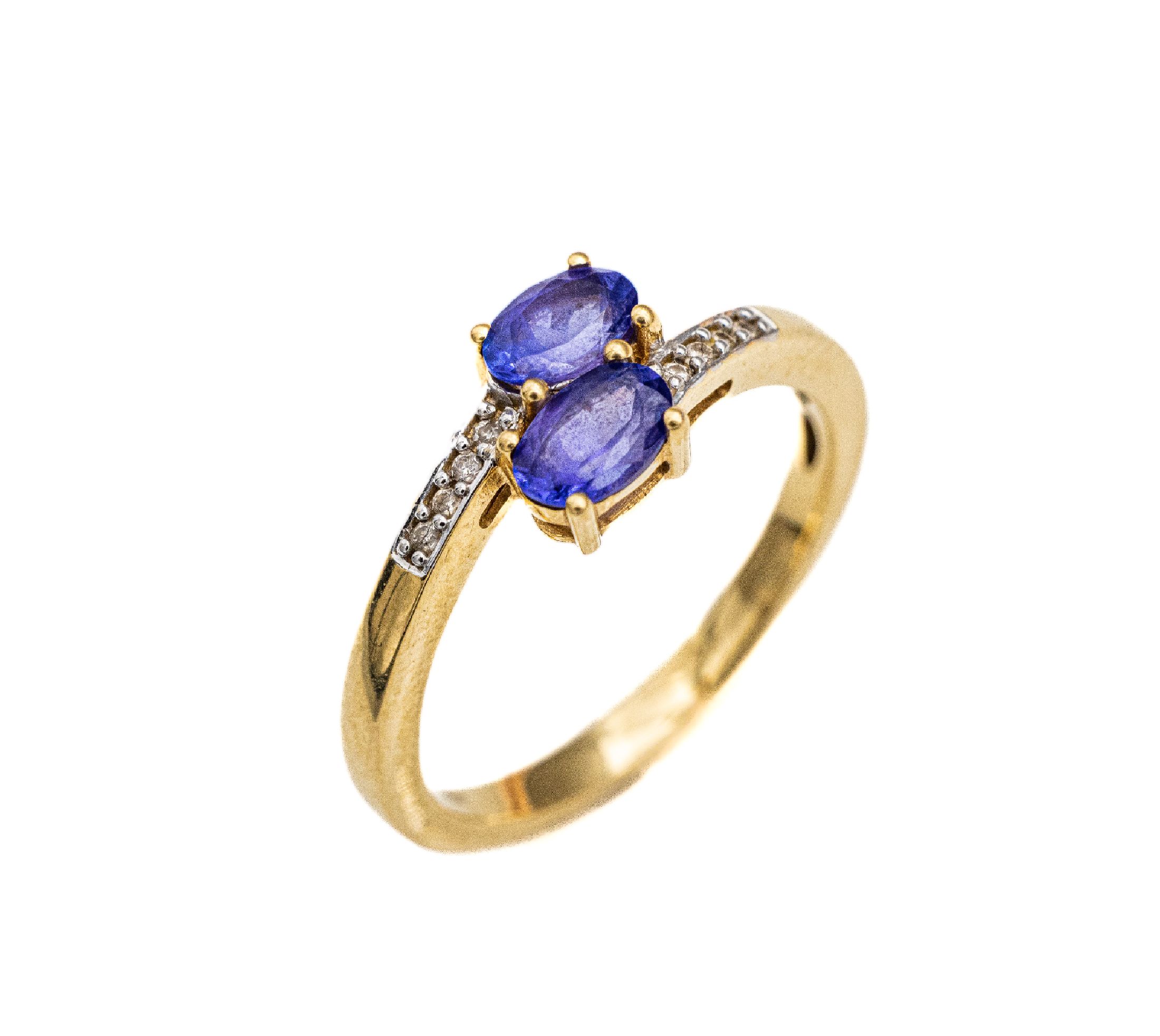 18 kt Gold Tansanit-Brillant-Ring, GG 750/000, 2 ovalfacett. Tansanite zus. ca. 0.70ct, 8 Brillanten zus. ca. 0.03 ct Weiß/si, RW 60, ca. 4.4 g, ...