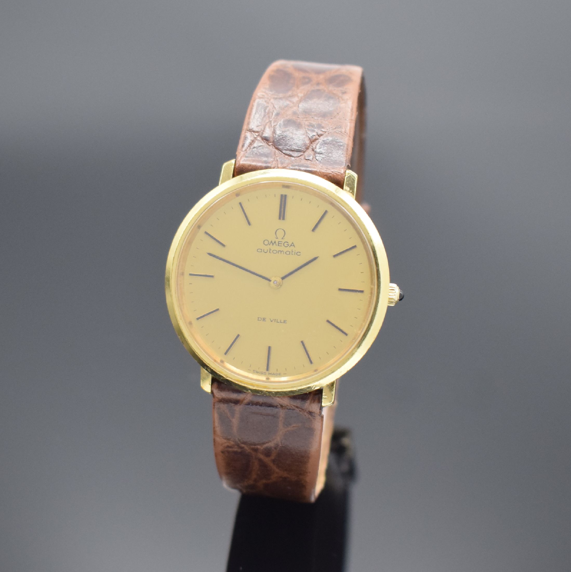 OMEGA De Ville Armbanduhr an Referenz 151.0039, Automatik, Schweiz um 1973, verg. Geh., Edelstahlboden aufgedr., Schmuckkrone, gold. Zifferbl. m. ...