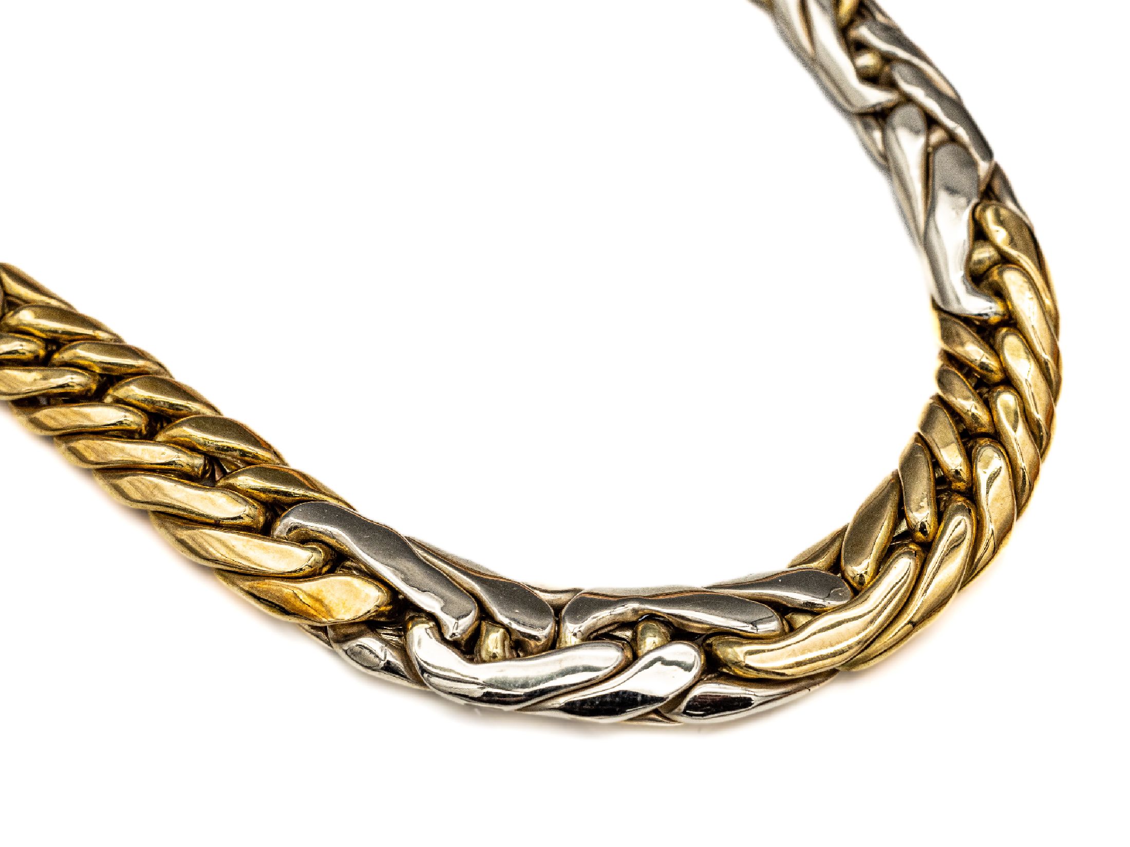 18 kt Gold Collier, , ca. 34.7 g, GG/WG 750/000, im Verlauf gearbeitet, GG und WG im Wechsel, L. ca. 45.5 cm, gr. Federringschließe