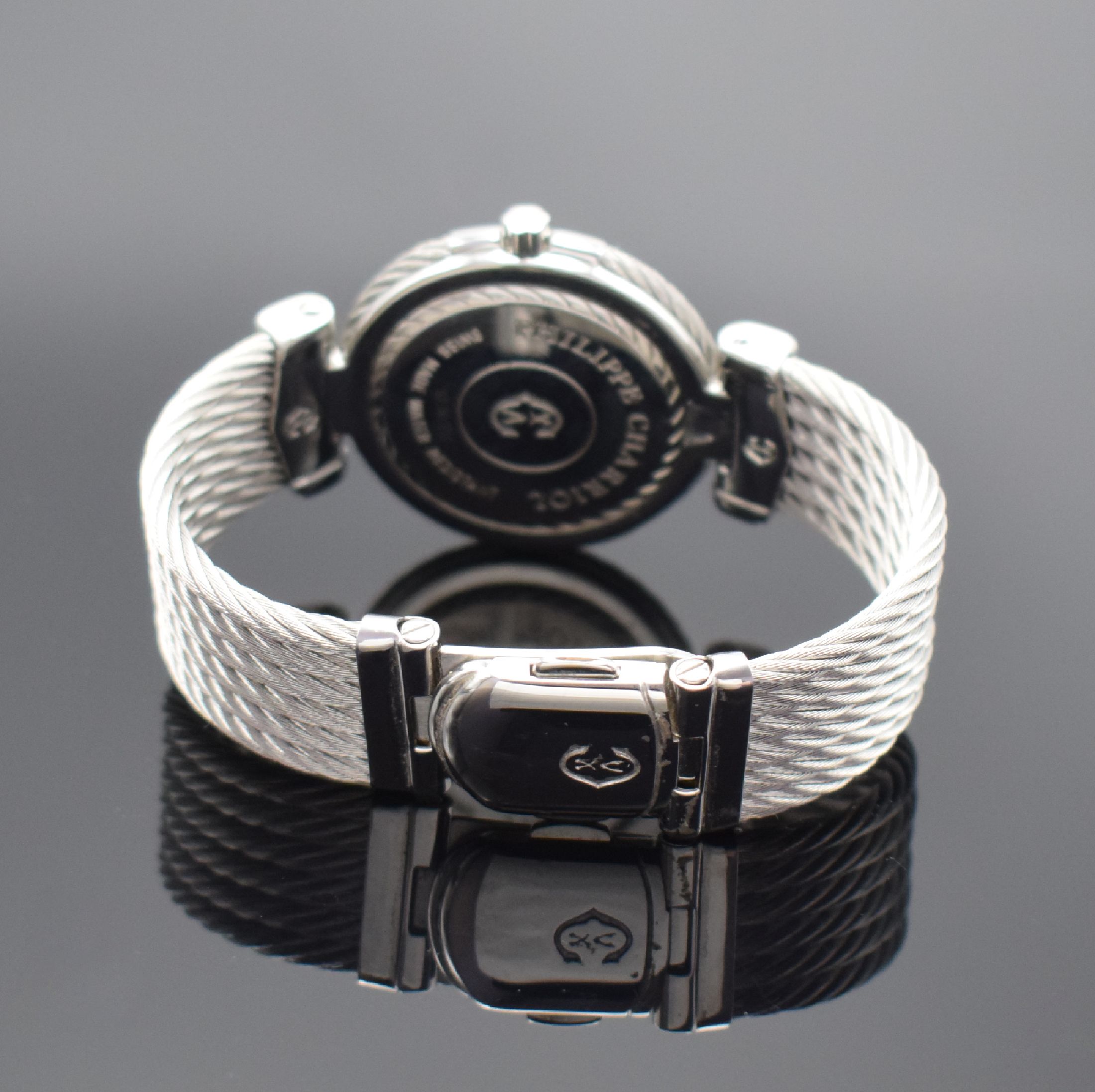 Detail b: PHILIPPE CHARRIOL Designerarmbanduhr, Schweiz um 1995, Edelstahlgeh. inkl. Gliederband aus gedrehtem Stahl, quarz, Boden aufgedr., blaues Zifferbl. ...