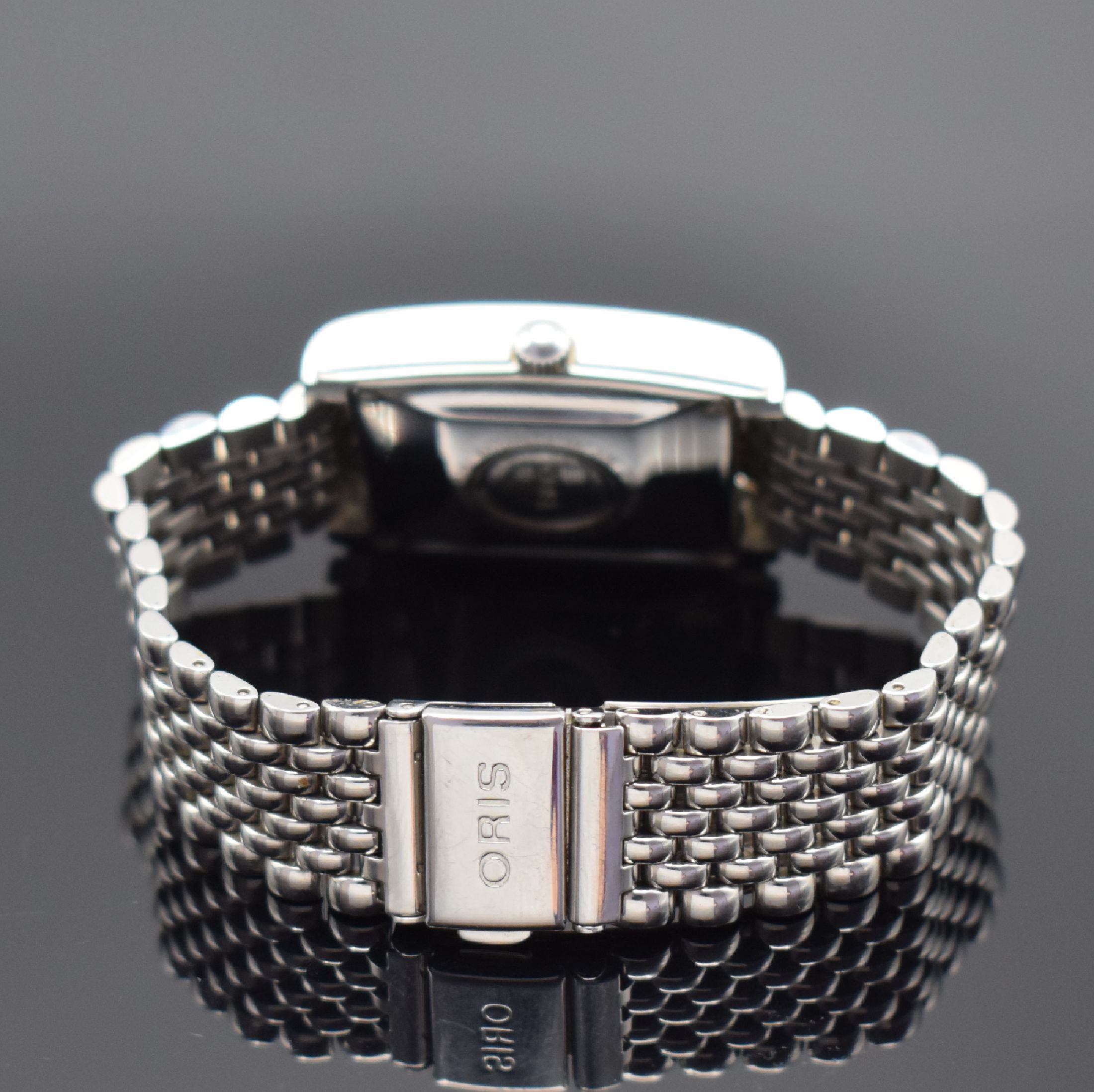 Detail b: ORIS rechteckige Herrenarmbanduhr min Edelstahl Referenz B7460, Schweiz um 1995, Boden 4-fach verschr., schwarzes Zifferbl. m. arab. Zahlen, ...