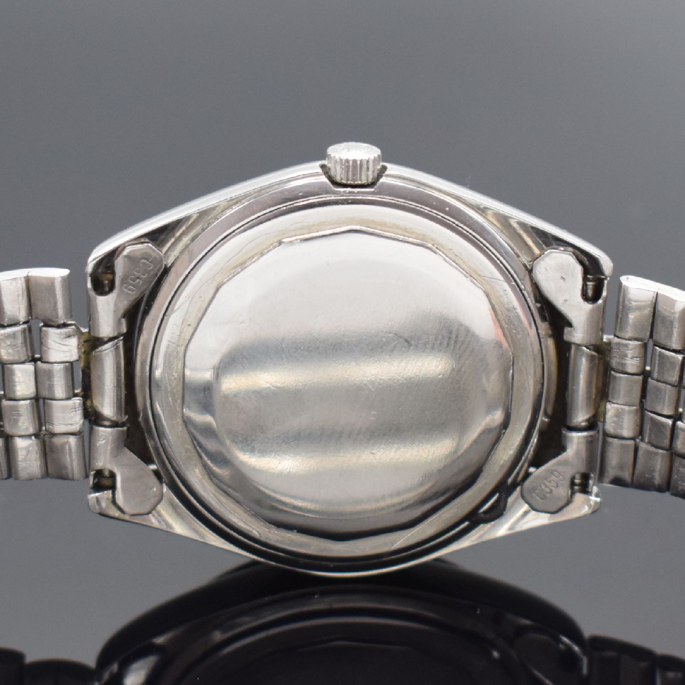 Detail d: LONGINES Conquest Herrenarmbanduhr in Stahl Referenz 7971, Schweiz um 1975, Automatik, Boden verschr., orig. Gliederband m. Faltschl., silb. ...
