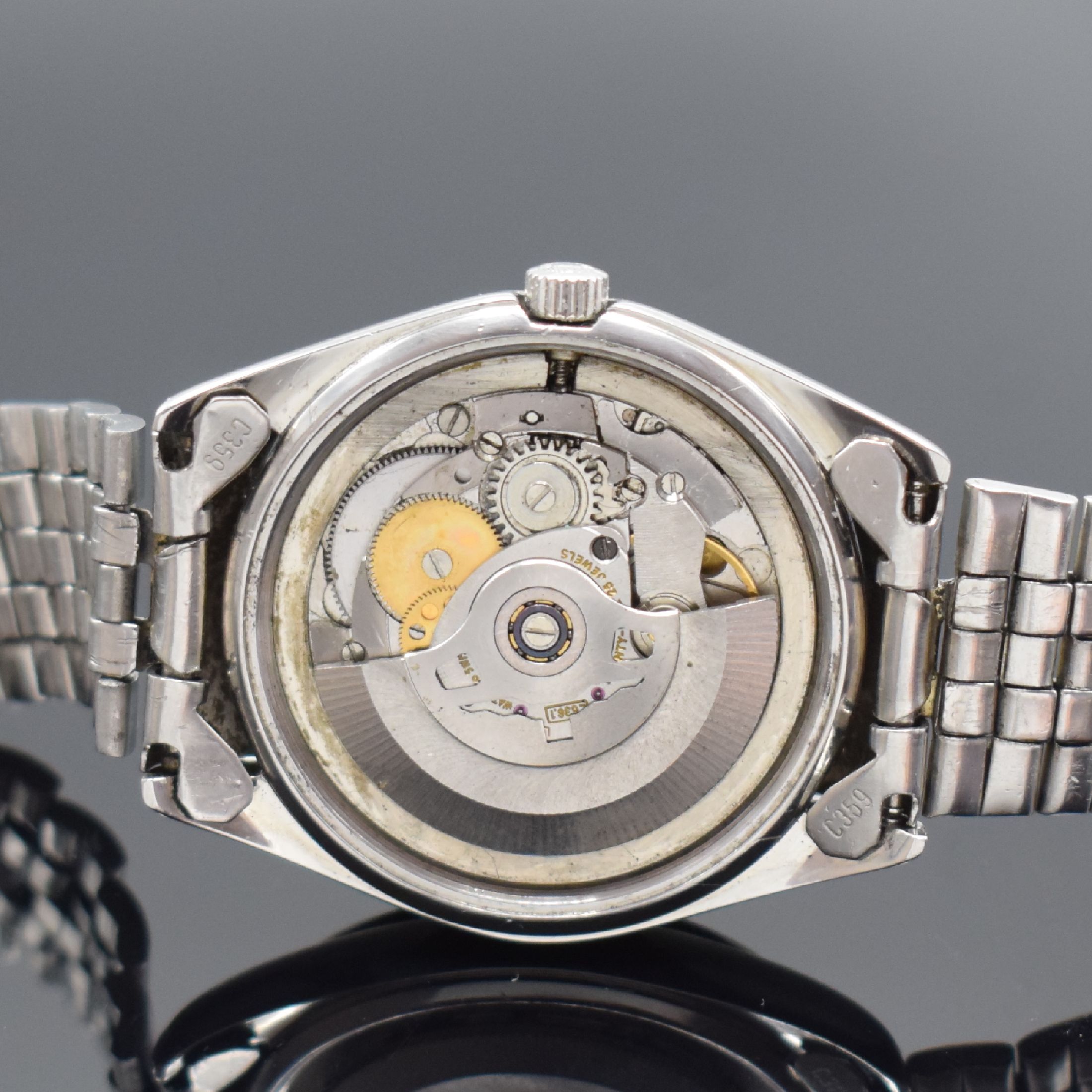 Detail e: LONGINES Conquest Herrenarmbanduhr in Stahl Referenz 7971, Schweiz um 1975, Automatik, Boden verschr., orig. Gliederband m. Faltschl., silb. ...