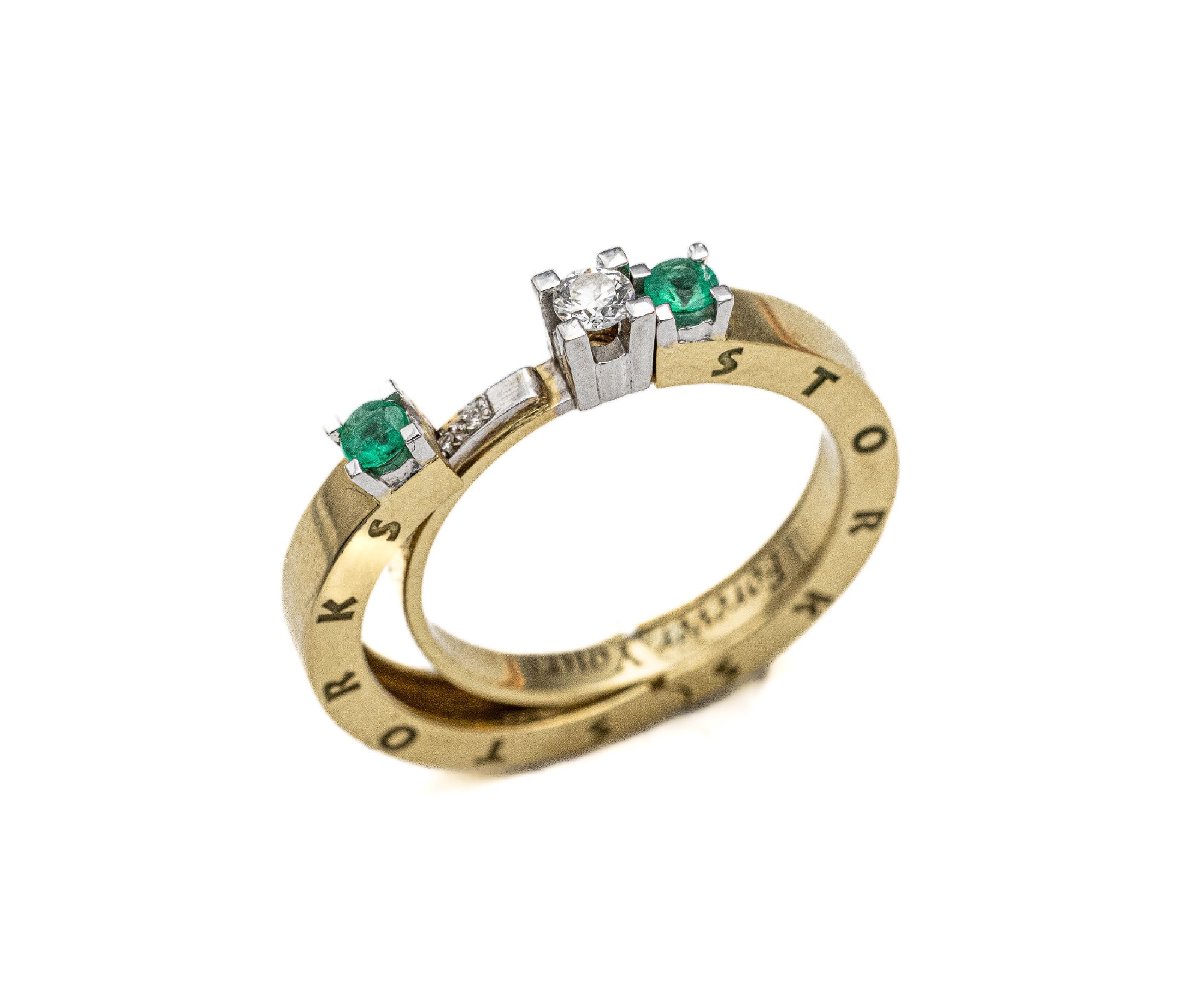 2-teiliger 18 kt Gold Smaragd-Brillant-Ring, sign. STORKS, GG/WG 750/000, 2 Smaragde rundfacett. zus. ca. 0.10 ct, 11 Brillanten zus. ca. 0.20 ct ...