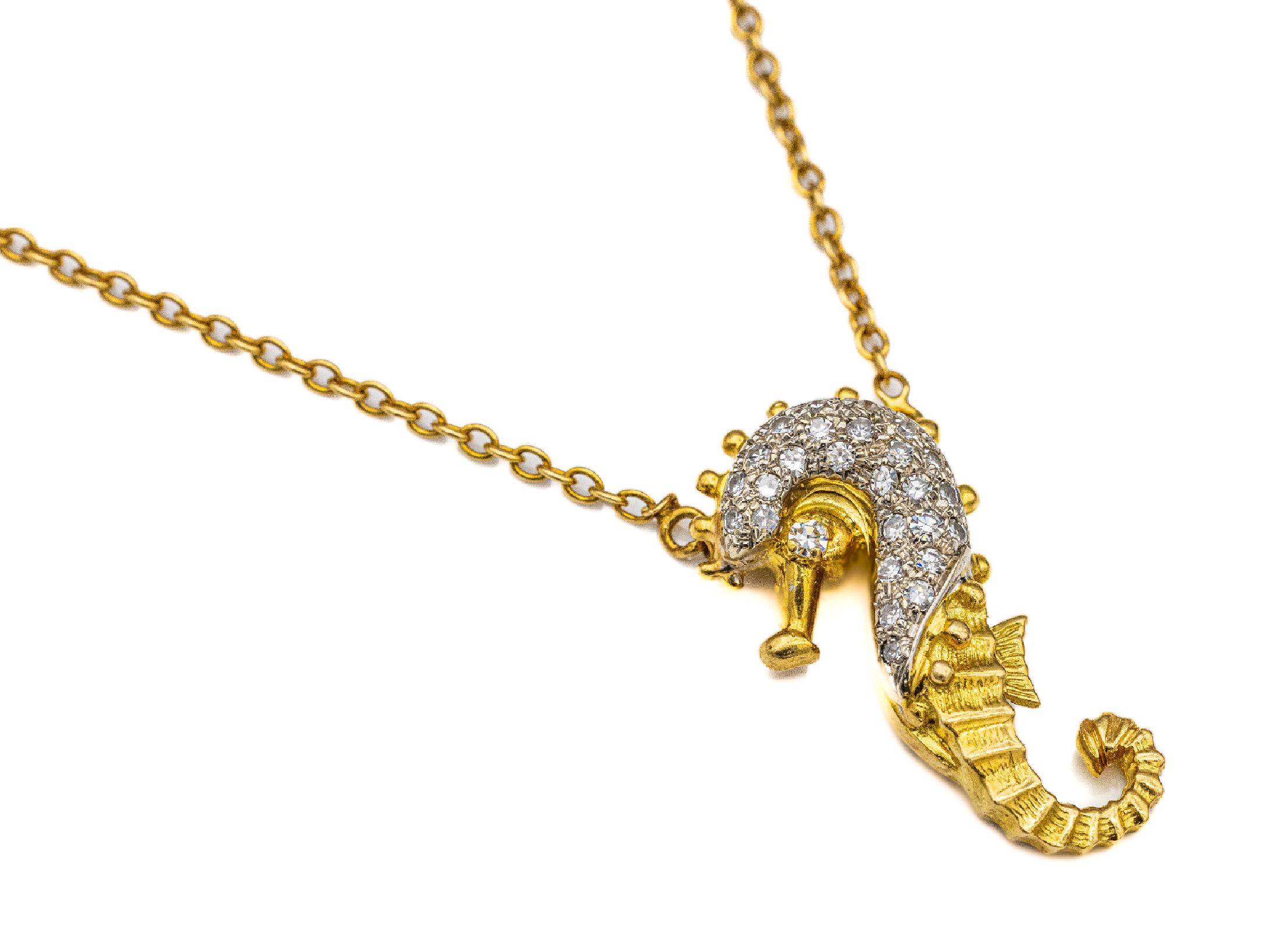 18 kt Gold Collier "Seepferdchen", GG/WG 750/000, 27 Brillanten zus. ca. 0.40 ct Weiß/si, L. ca. 39 cm, Seepferdchen l. ca. 3 cm, ca. 8.9 ...